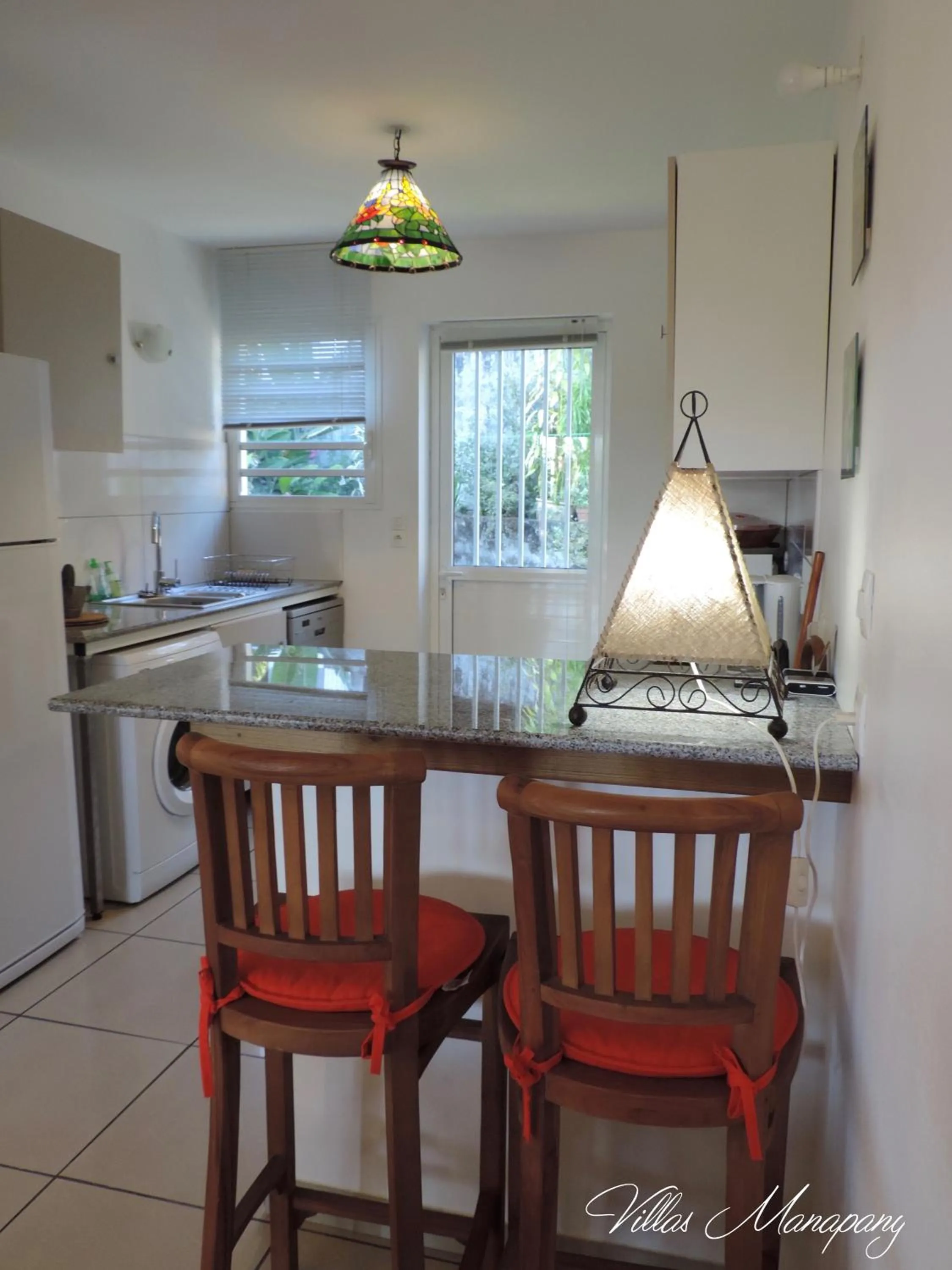 Kitchen or kitchenette in Villas Manapany