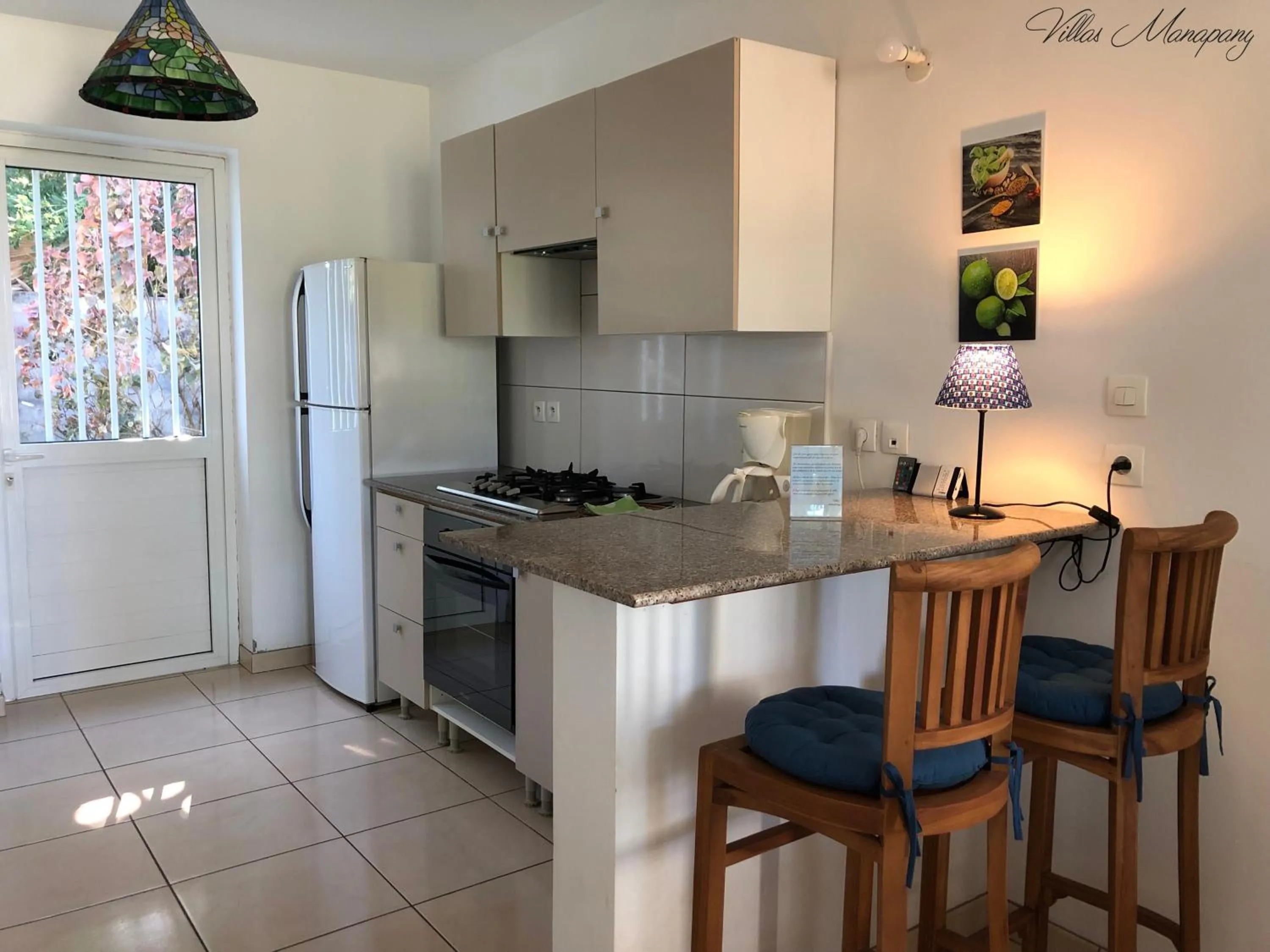 Kitchen or kitchenette in Villas Manapany