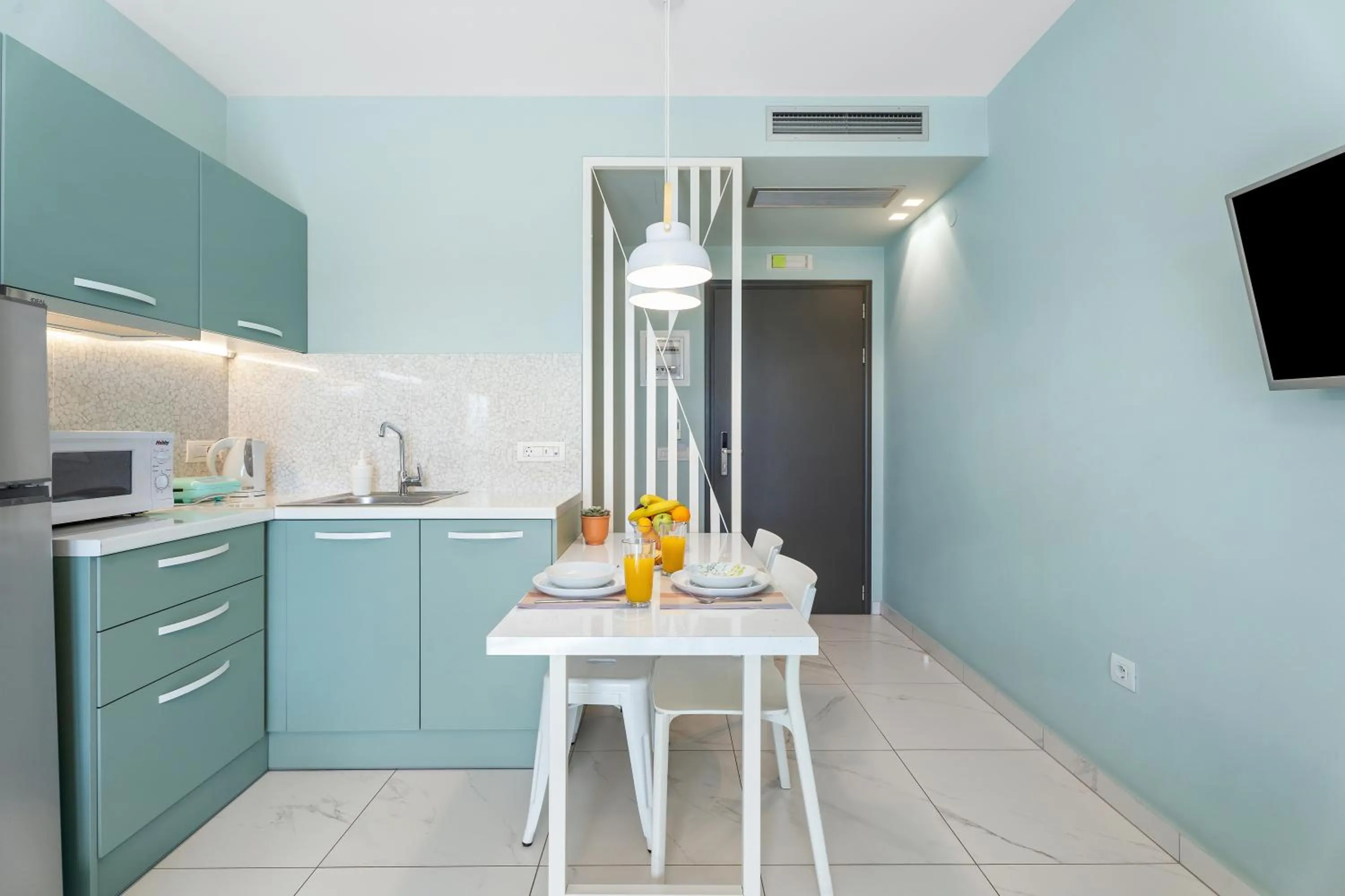 Kitchen or kitchenette in Frunze Luxury Apartments