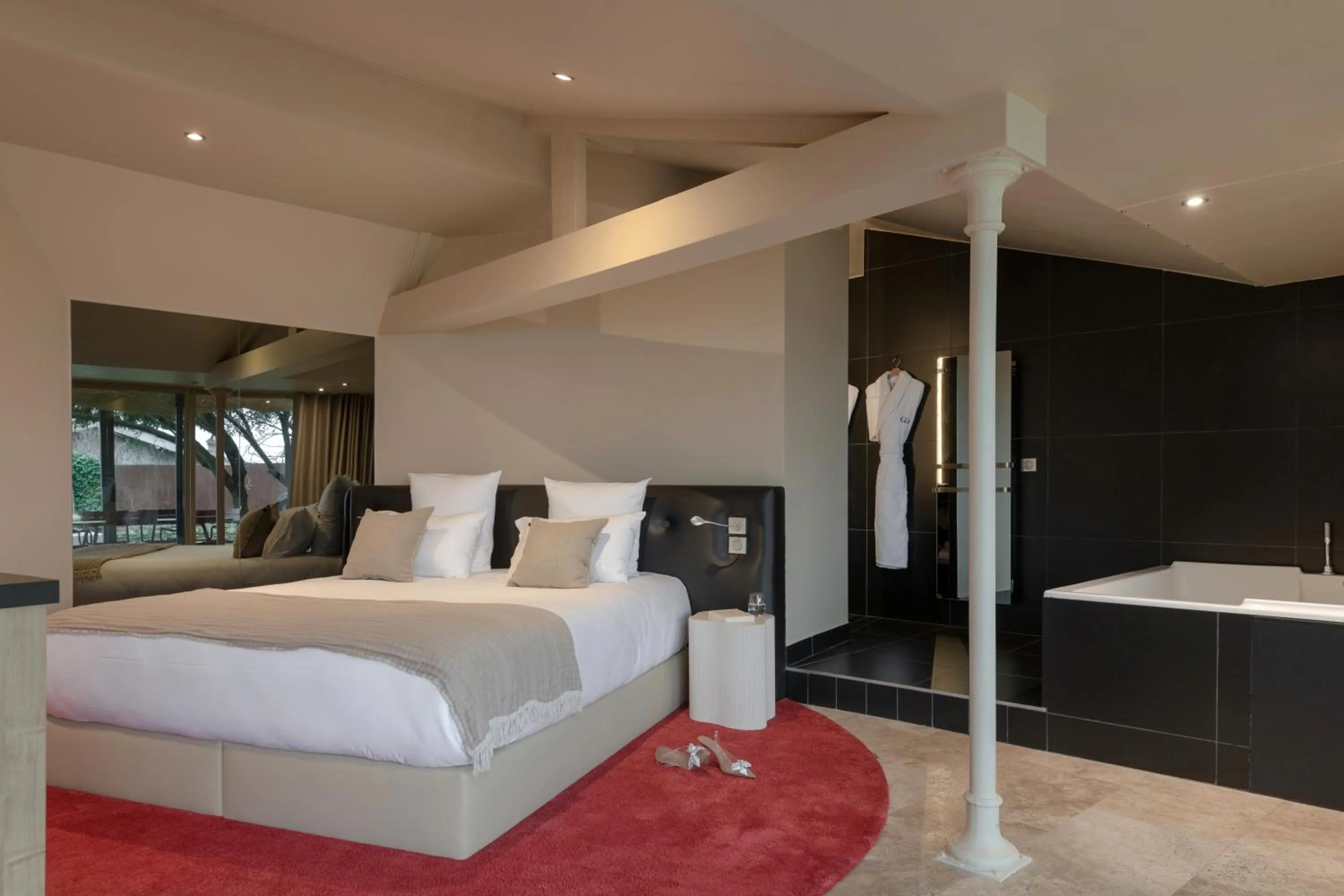 Bed in MiHotel Le Gourguillon