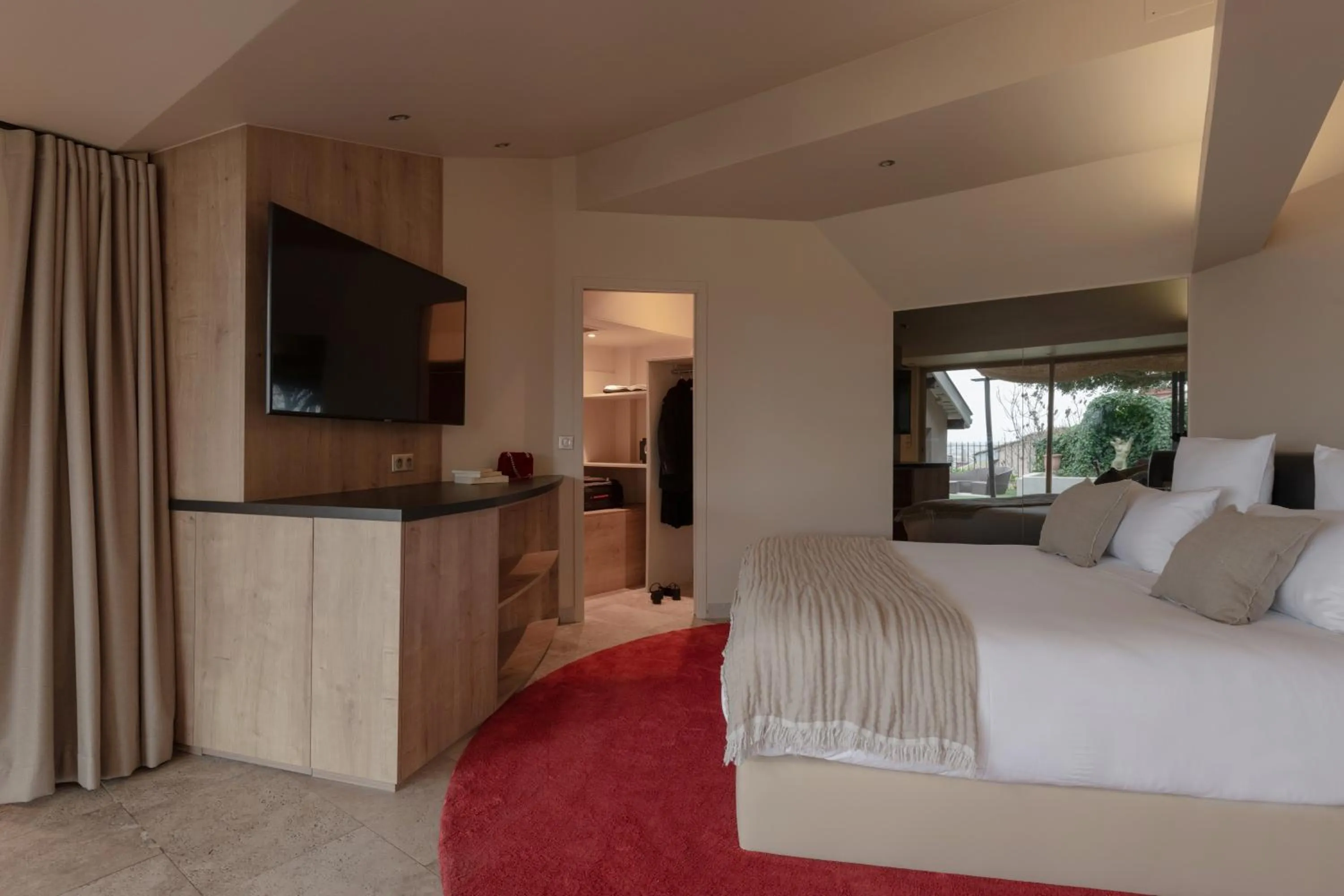 Bed in MiHotel Le Gourguillon