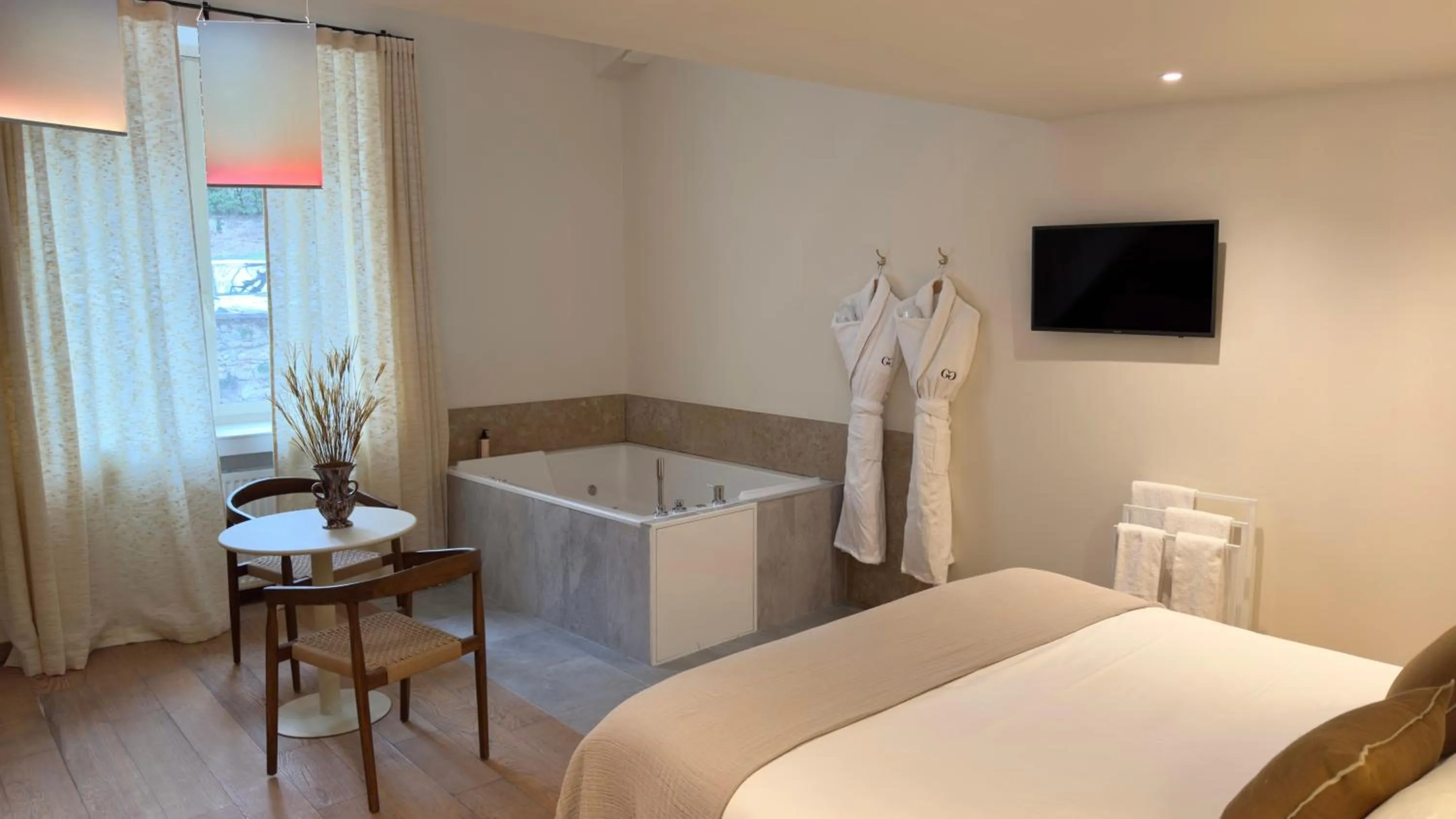 Bed in MiHotel Le Gourguillon