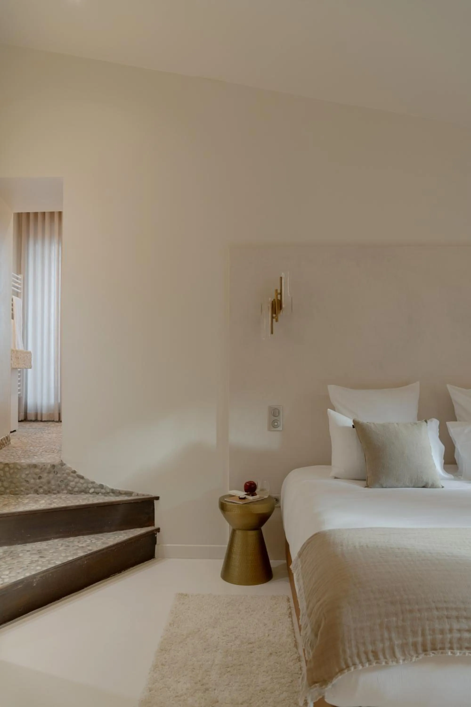 Bed in MiHotel Le Gourguillon