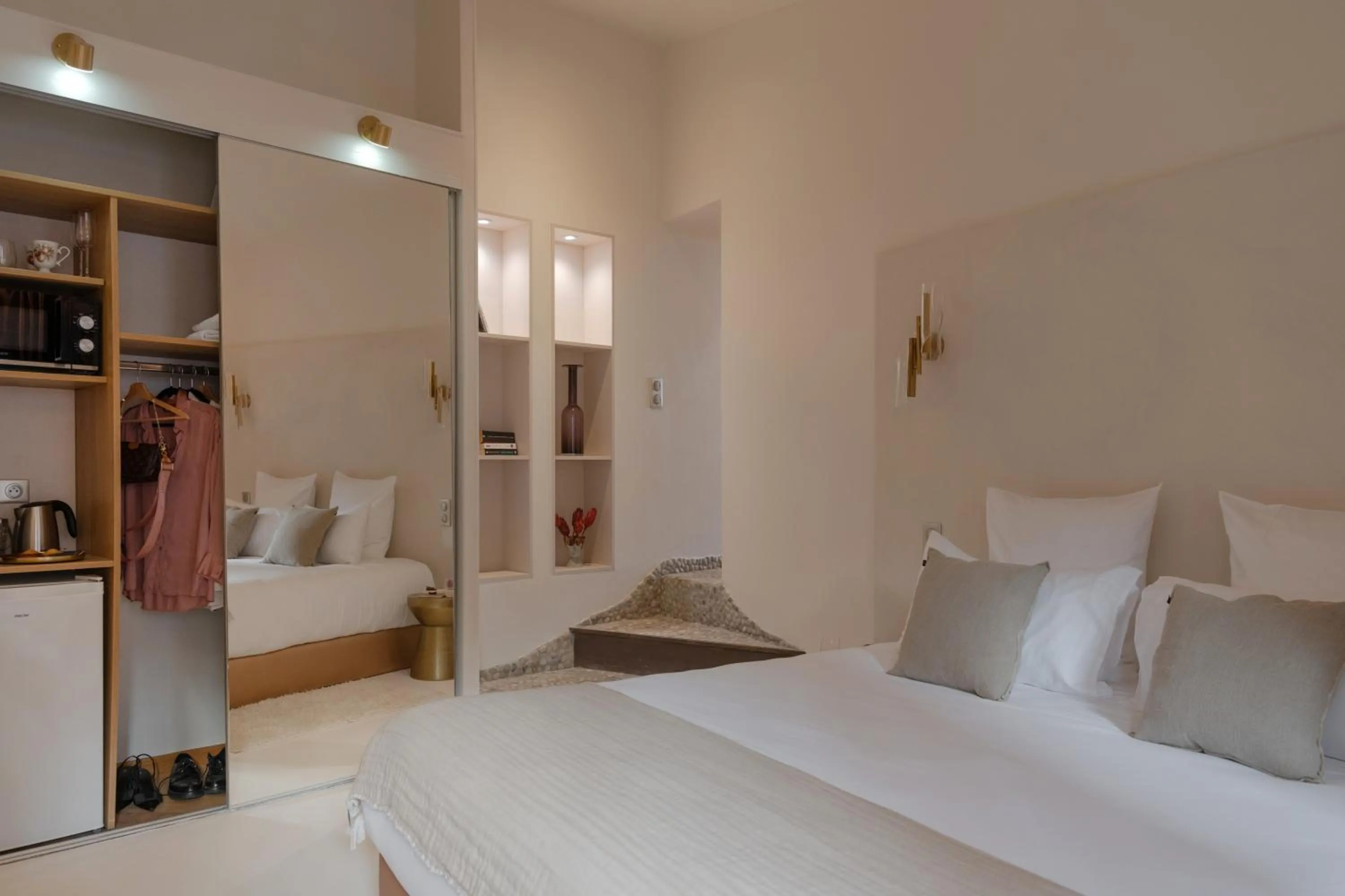 Bed in MiHotel Le Gourguillon