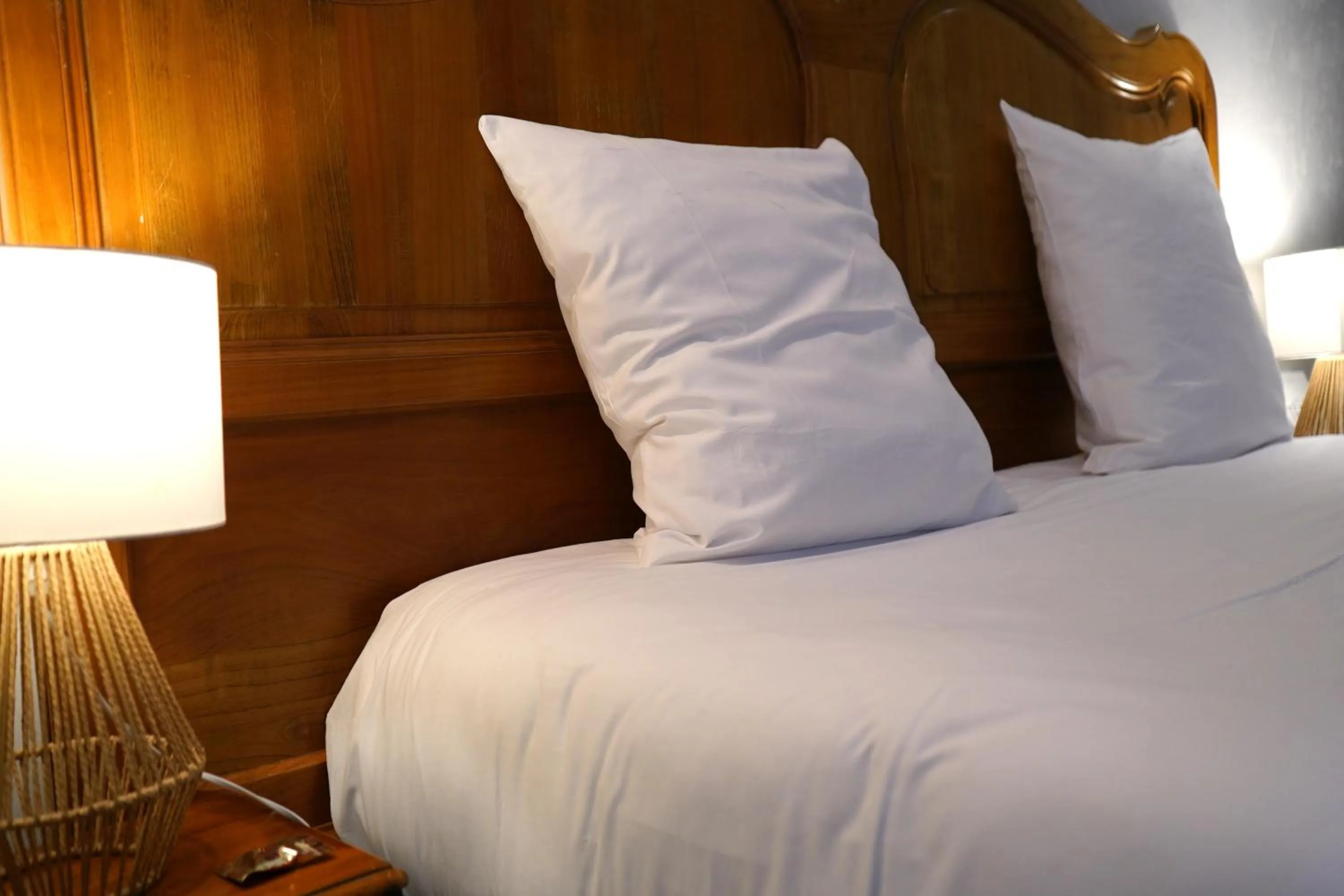 Bed in Maison Jenny Hotel Restaurant & Spa