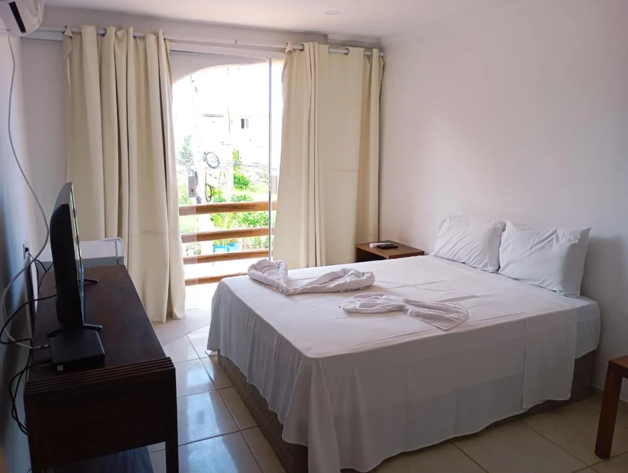 Bed in Pousada Água de Fuego