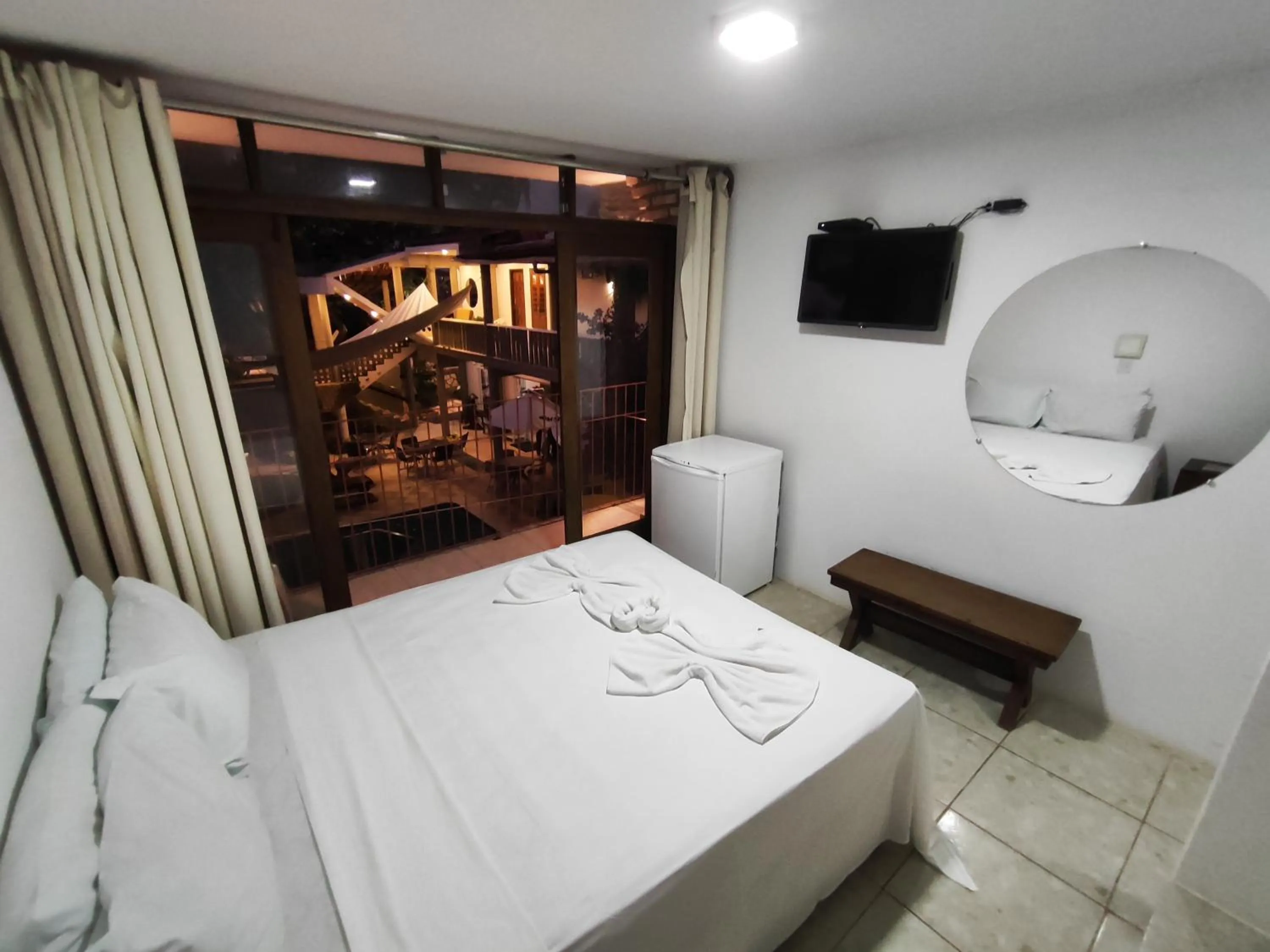 Bed in Pousada Água de Fuego