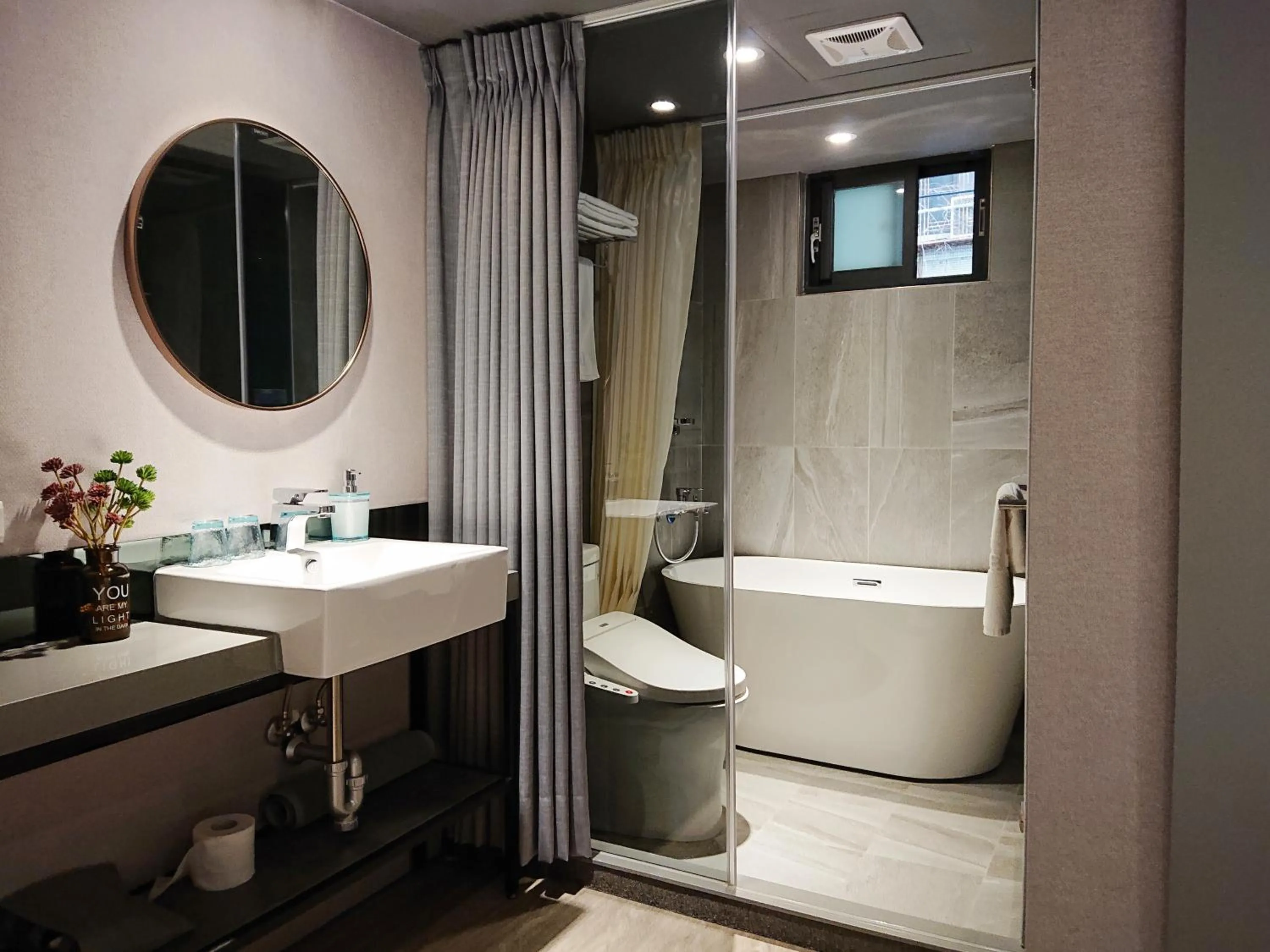 Bathroom in Cho Hotel 3