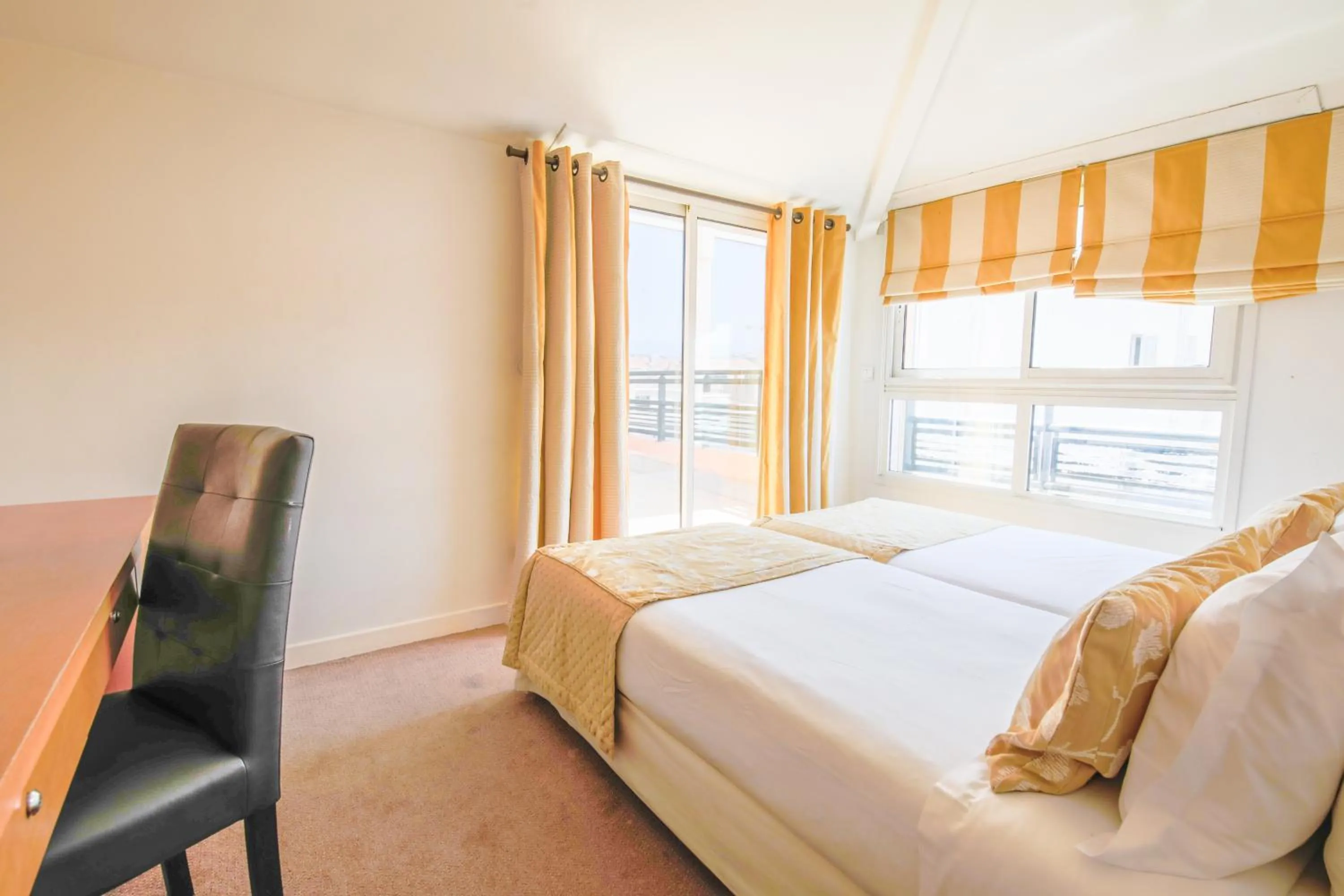 Bed in Cannes Croisette Prestige Apart'hotel