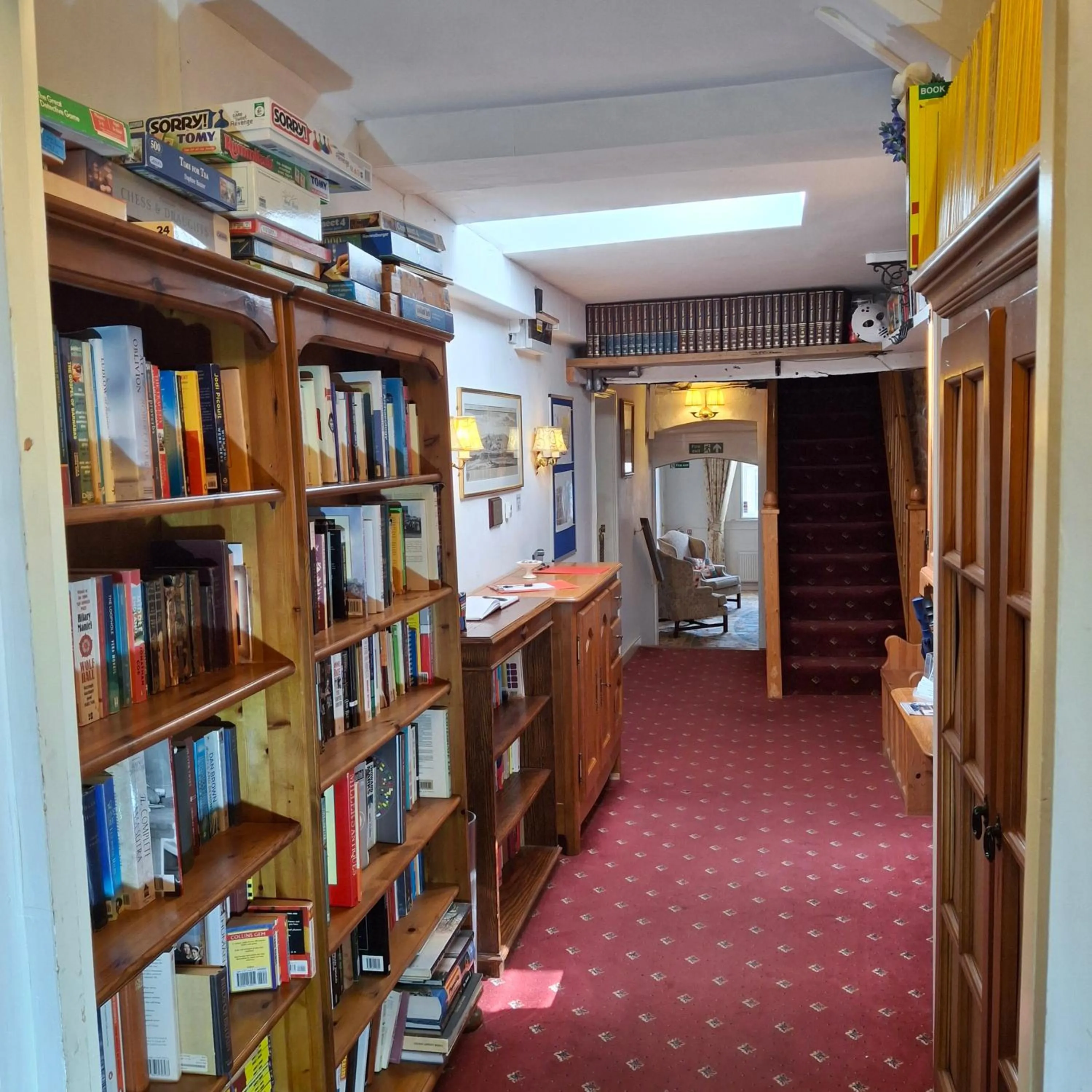 Library in The Abbey Hotel & Apartments
