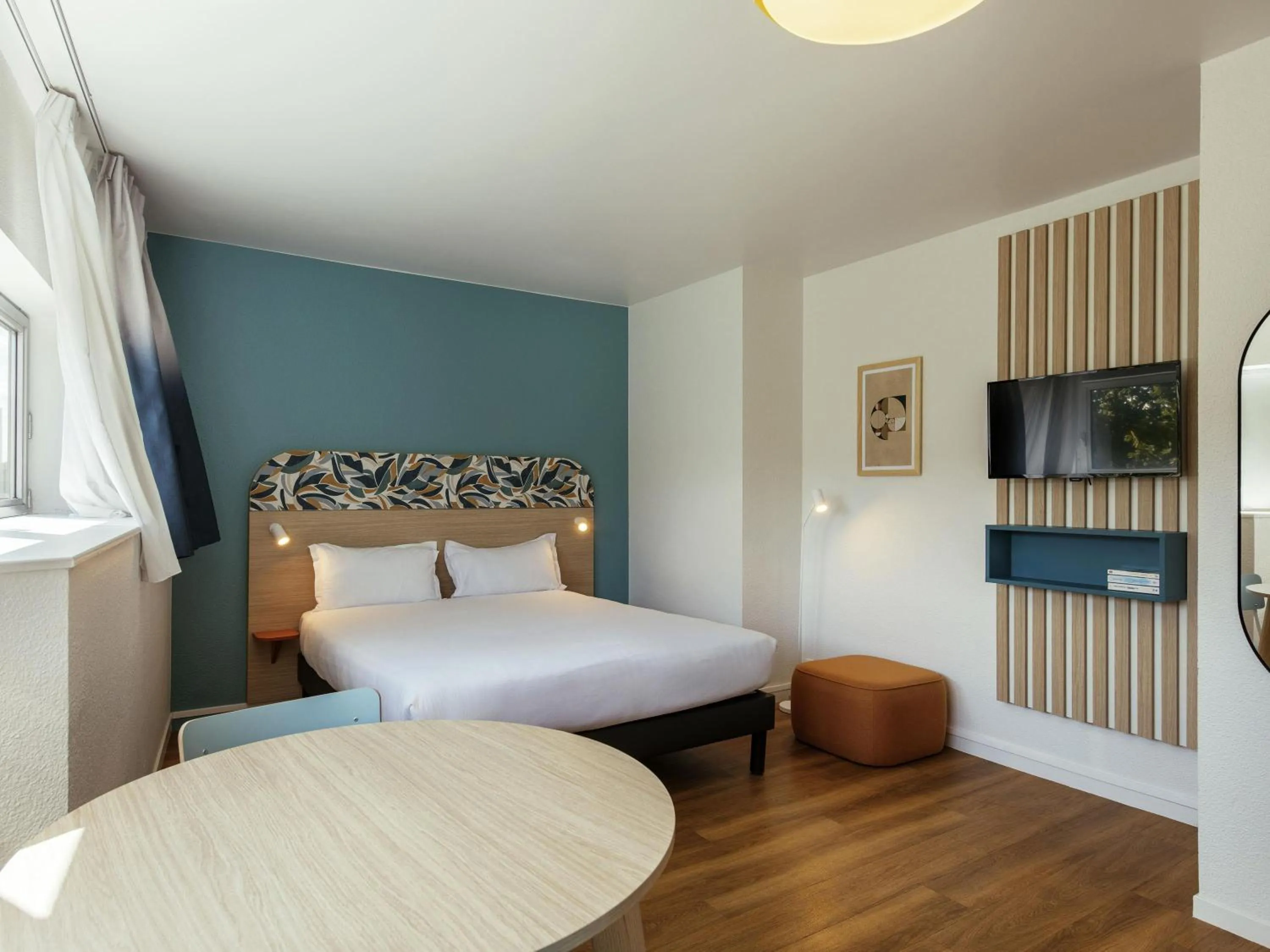 Bedroom, Bed in Aparthotel Adagio Access Paris La Villette
