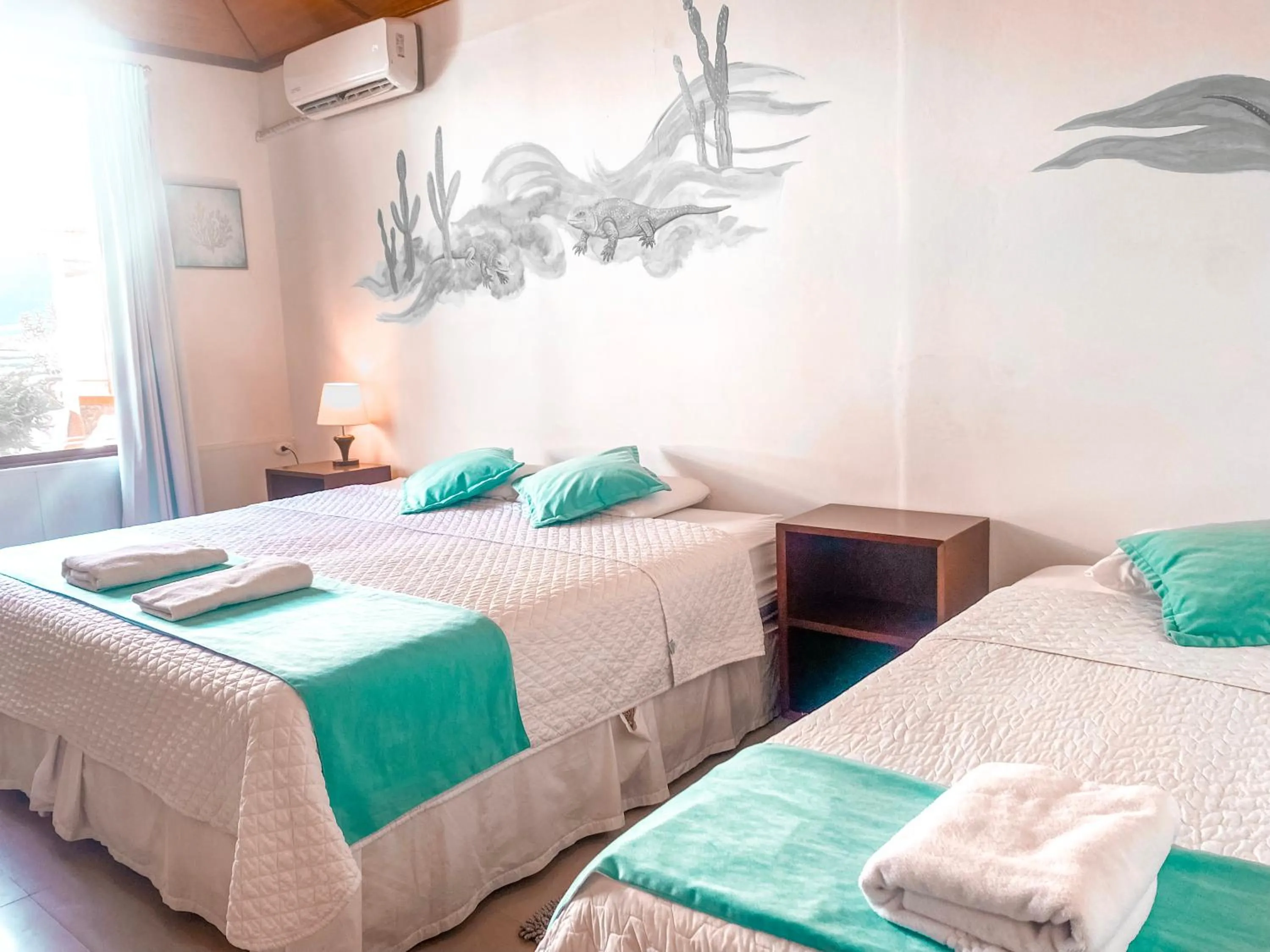 Bed in Hotel Coral Blanco with high speed internet Starlink and Galapagos Tour Operator