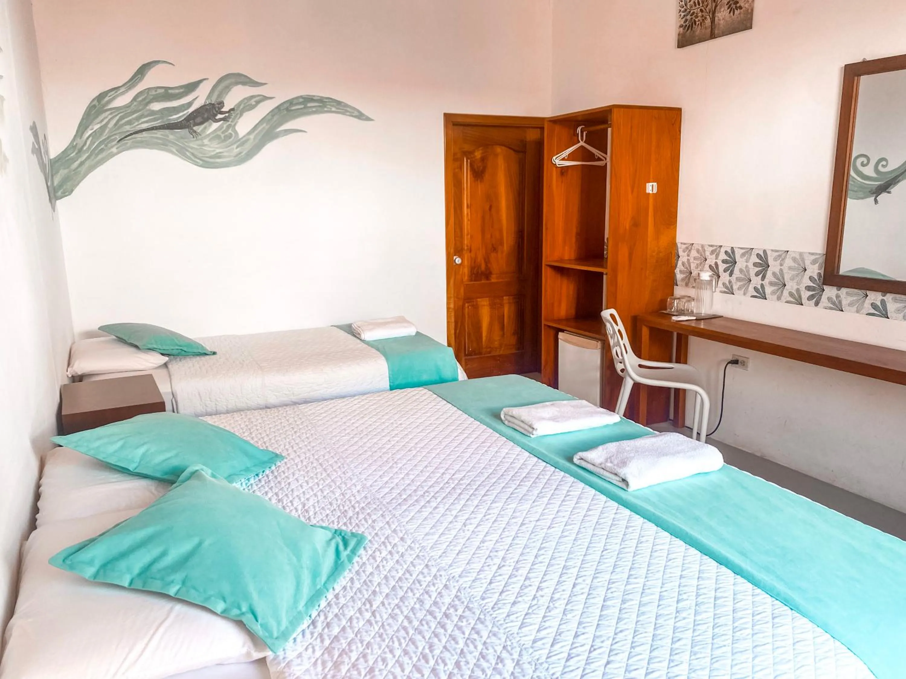 Bed in Hotel Coral Blanco with high speed internet Starlink and Galapagos Tour Operator