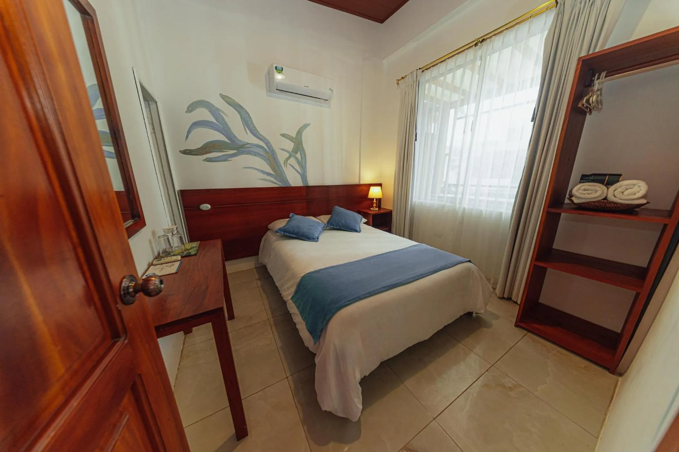 Bed in Hotel Coral Blanco with high speed internet Starlink and Galapagos Tour Operator