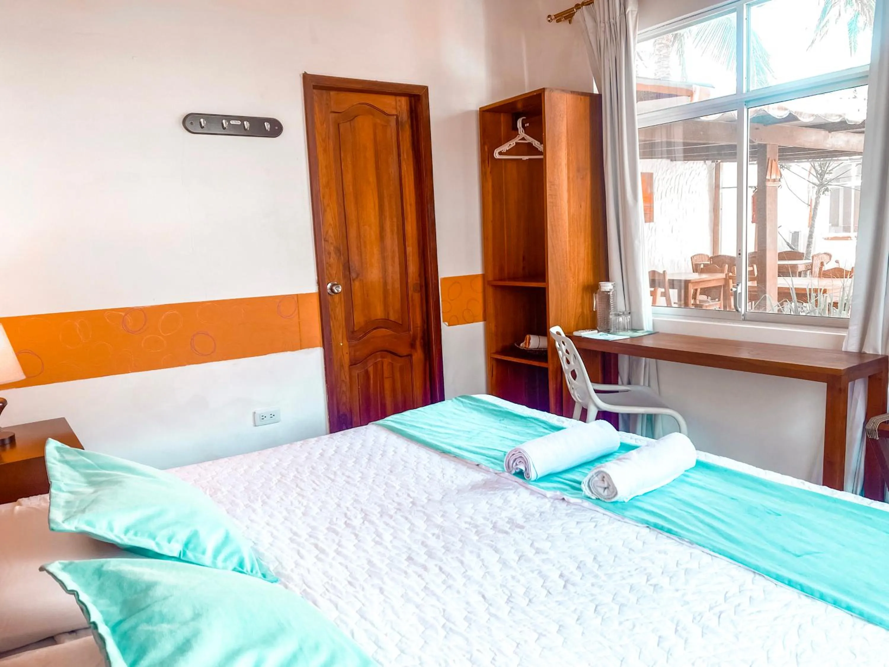 Bed in Hotel Coral Blanco with high speed internet Starlink and Galapagos Tour Operator