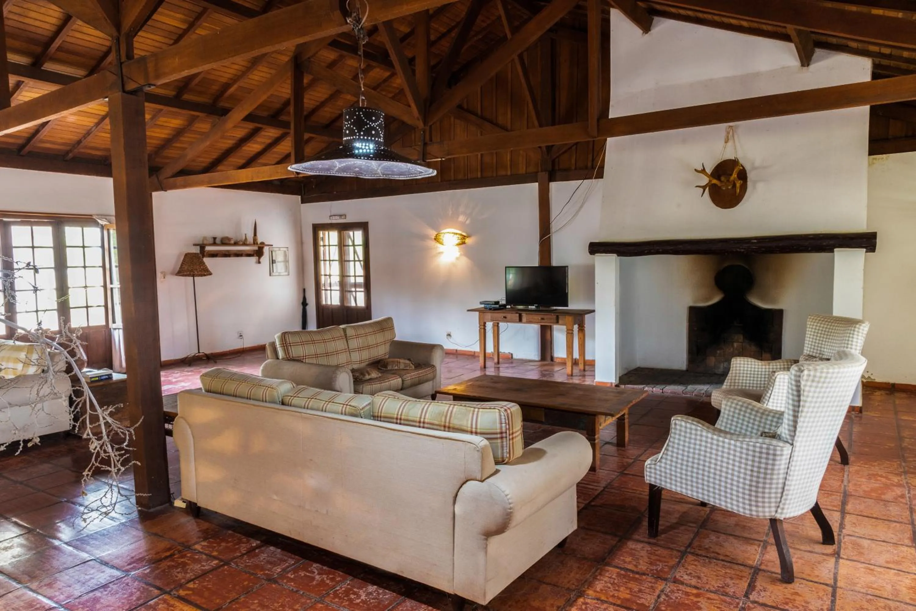 Communal lounge/ TV room in Pousada Fazenda Xaraés