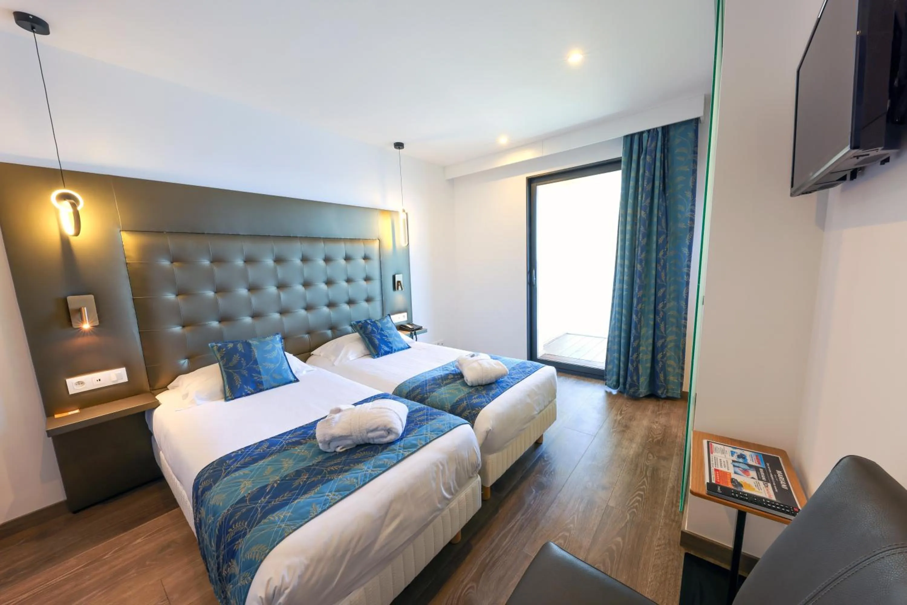 Bed in Hotel Saint Christophe