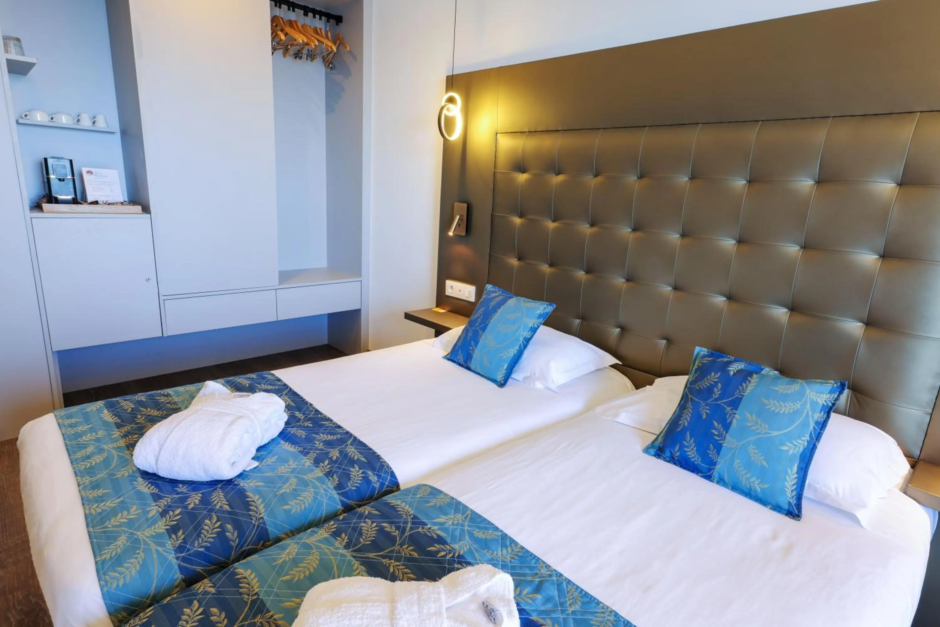 Bed in Hotel Saint Christophe