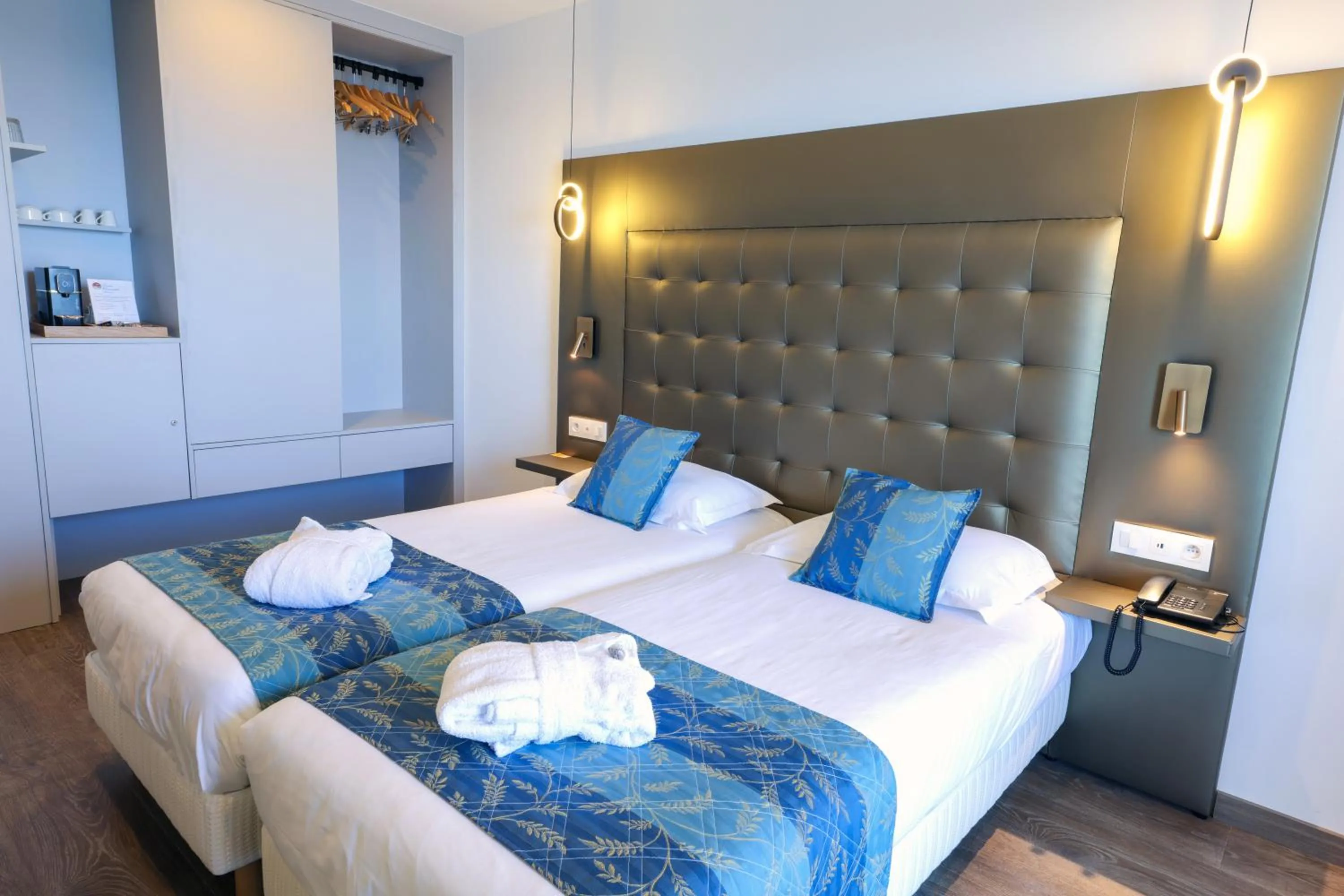 Bed in Hotel Saint Christophe