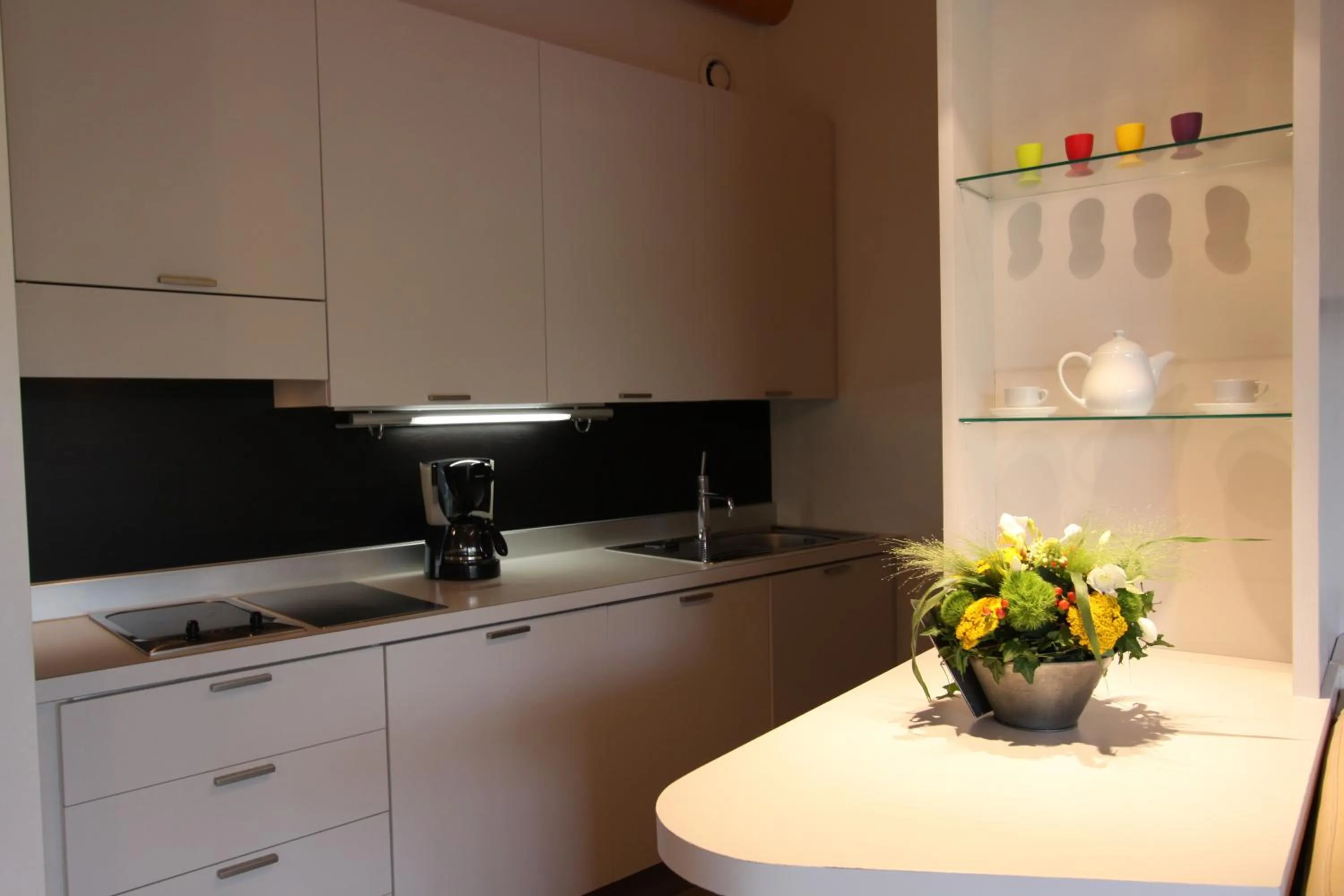 Kitchen or kitchenette in Résidence Cala Sultana