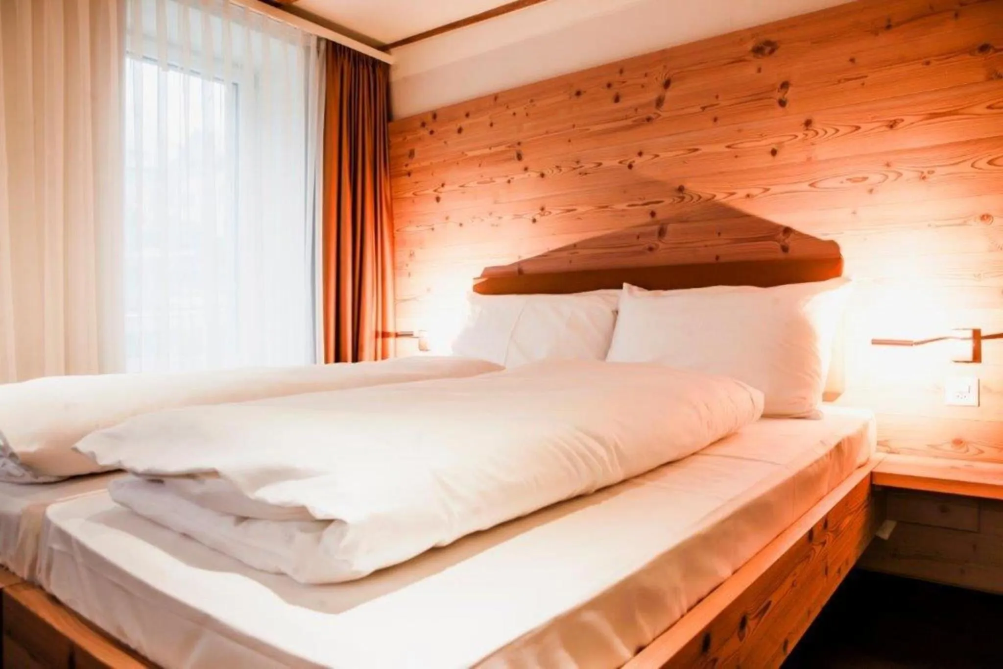 Bed in Boutique Hotel Waldegg - Self-Check-in