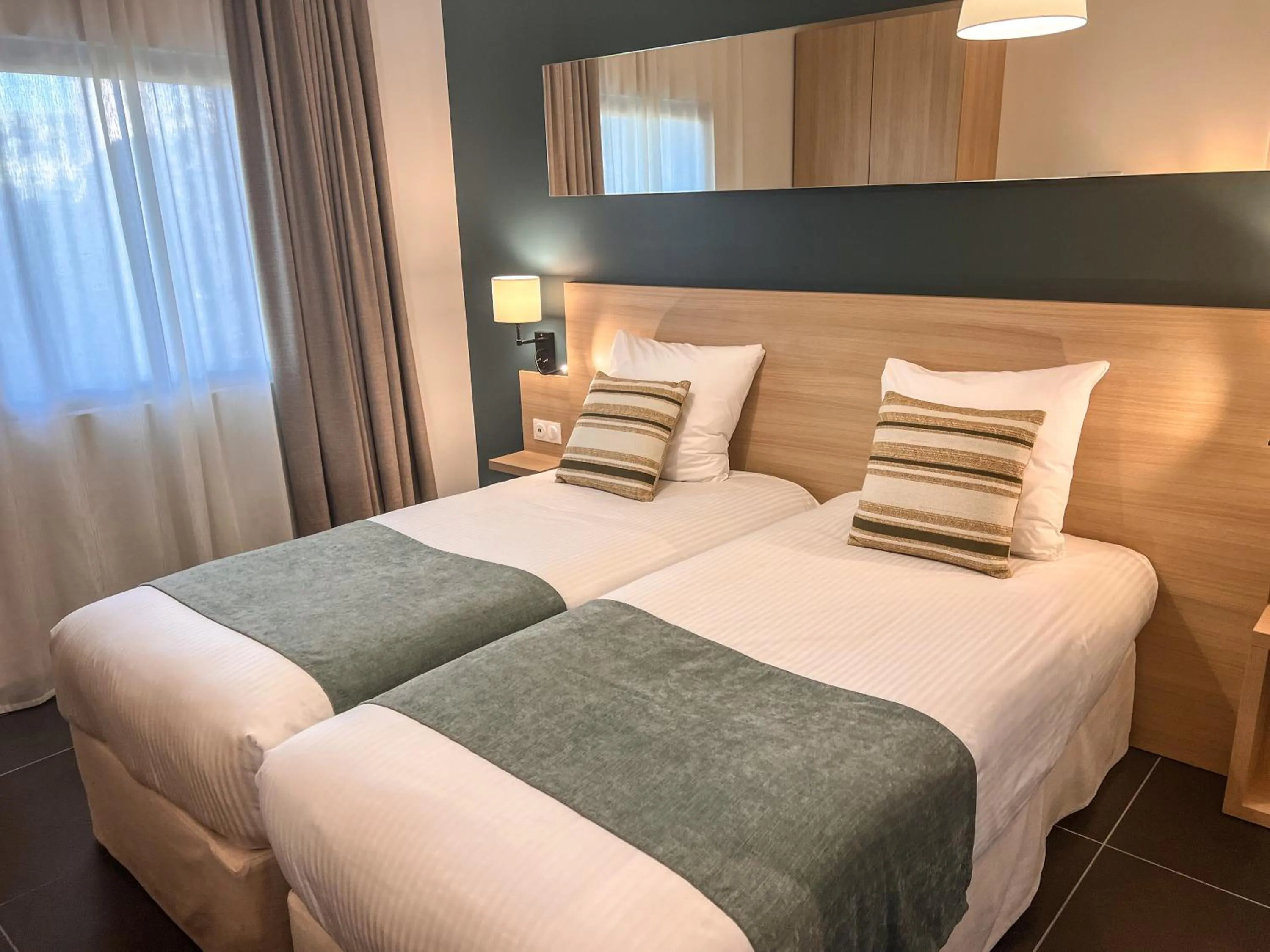 Bed in Hôtel & Lodges Moby Dick