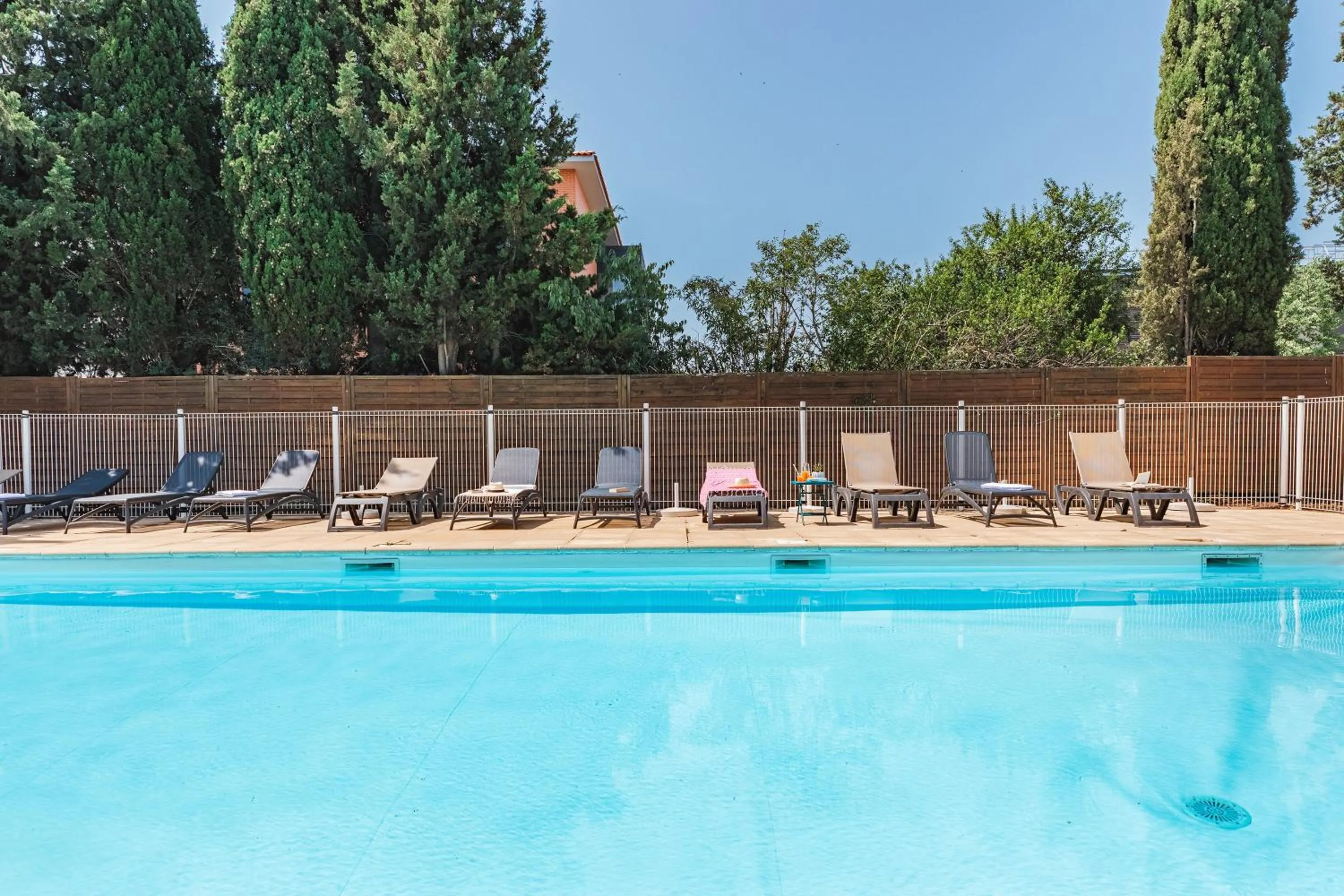 Swimming pool in Appart'City Classic Toulouse Saint-Simon