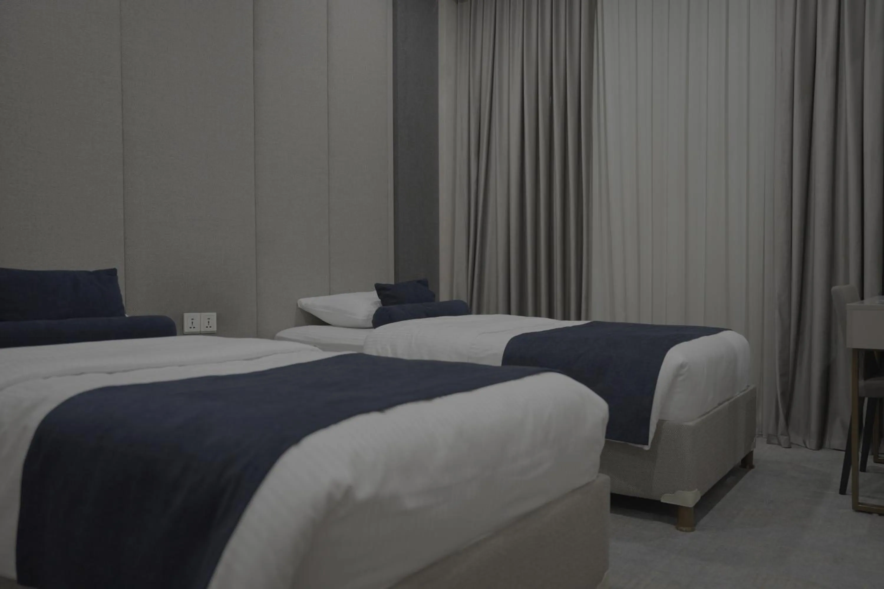 Bed in Darin Plaza Hotel