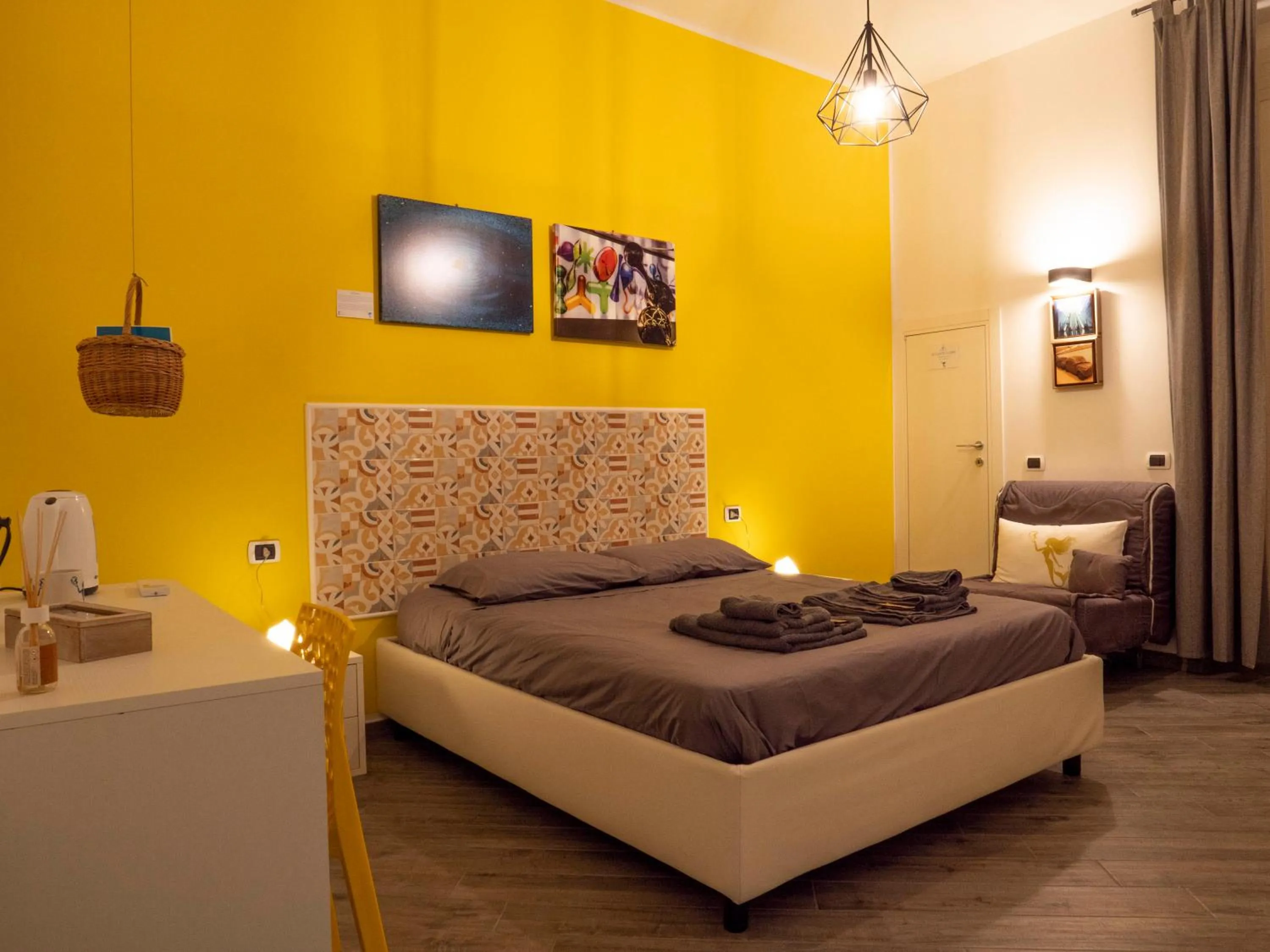 Bed in B&B Cosmoneapolitan