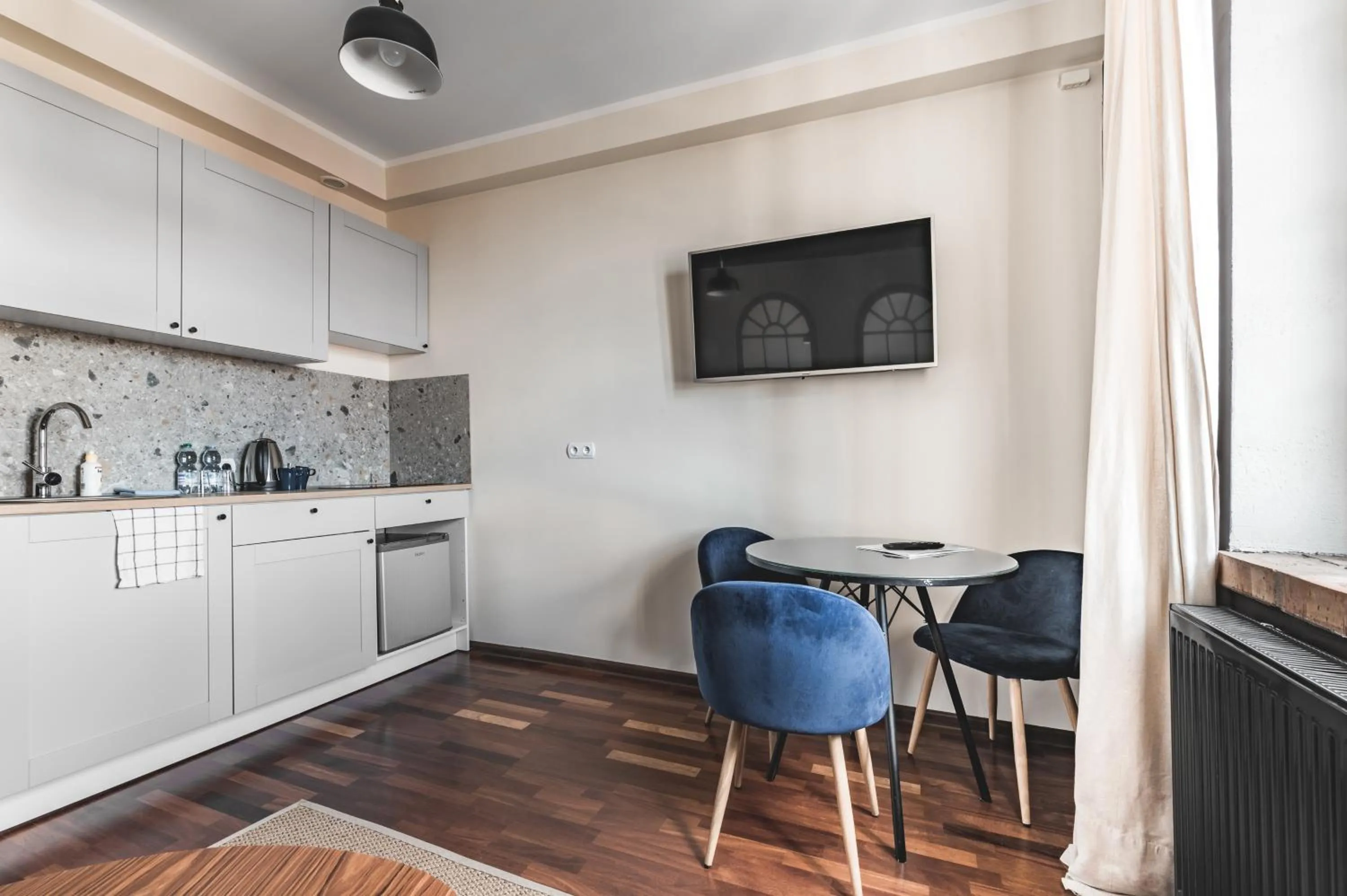 TV and multimedia in Aparthotel Stara Przędzalnia