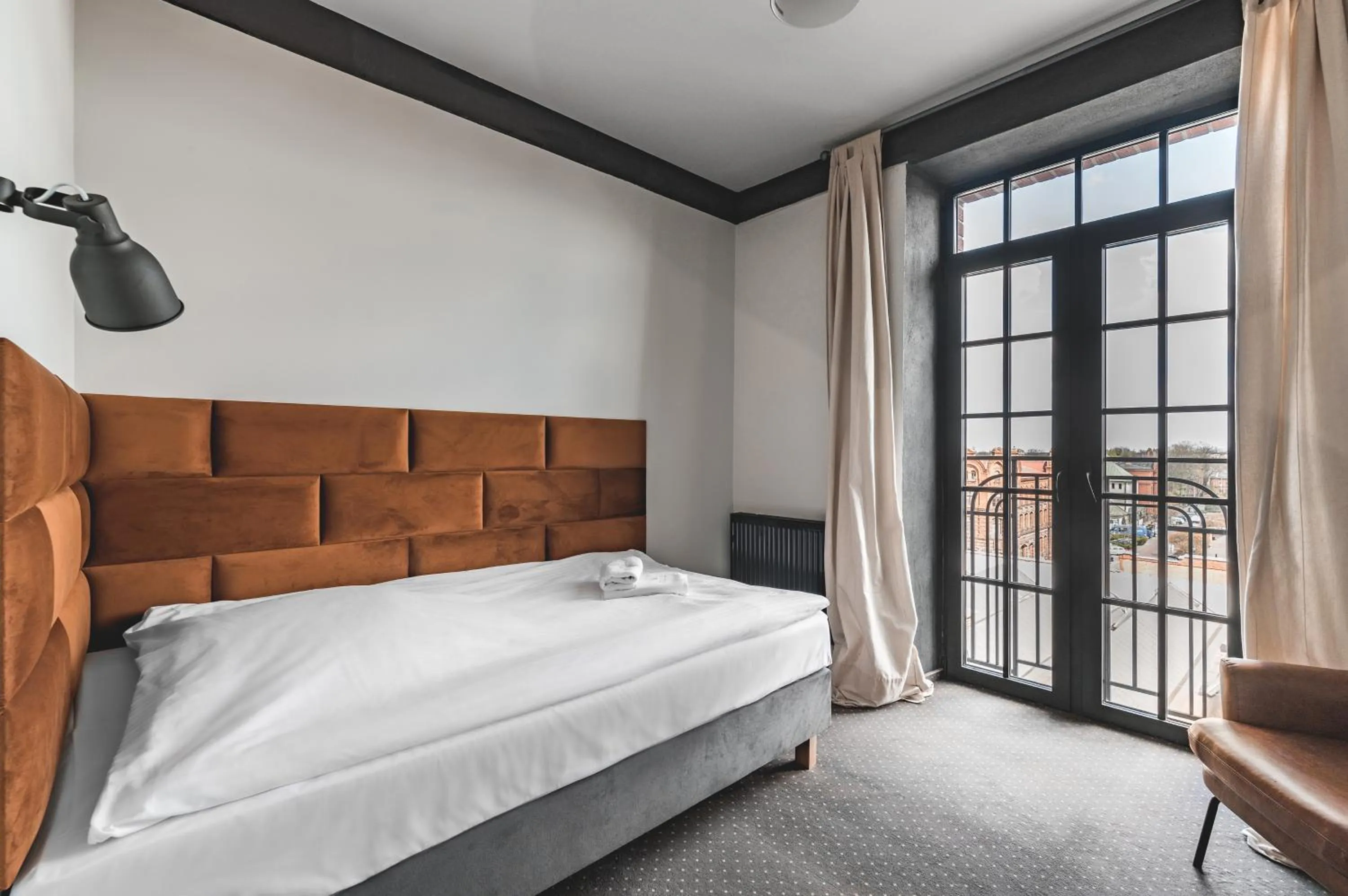 Bed in Aparthotel Stara Przędzalnia