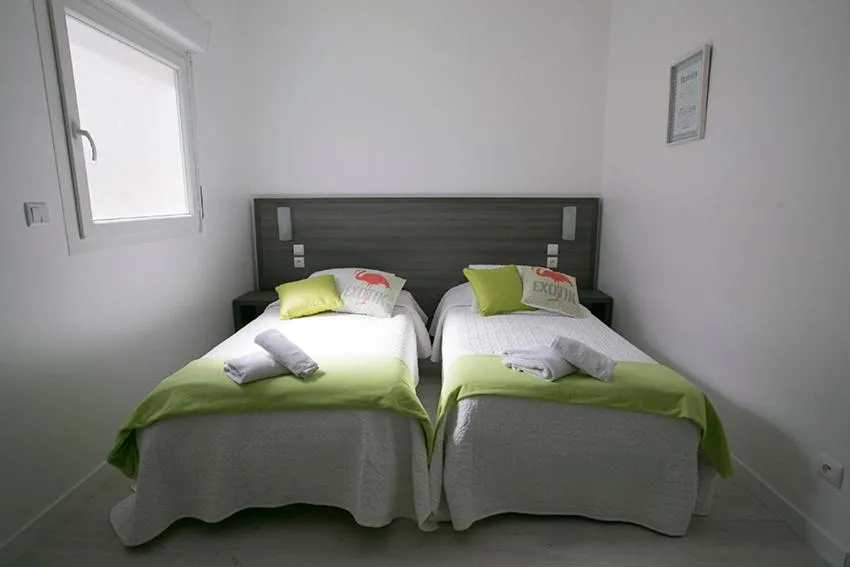 Bedroom, Bed in Le Grand Large Bord de Mer Hotel & Appartements