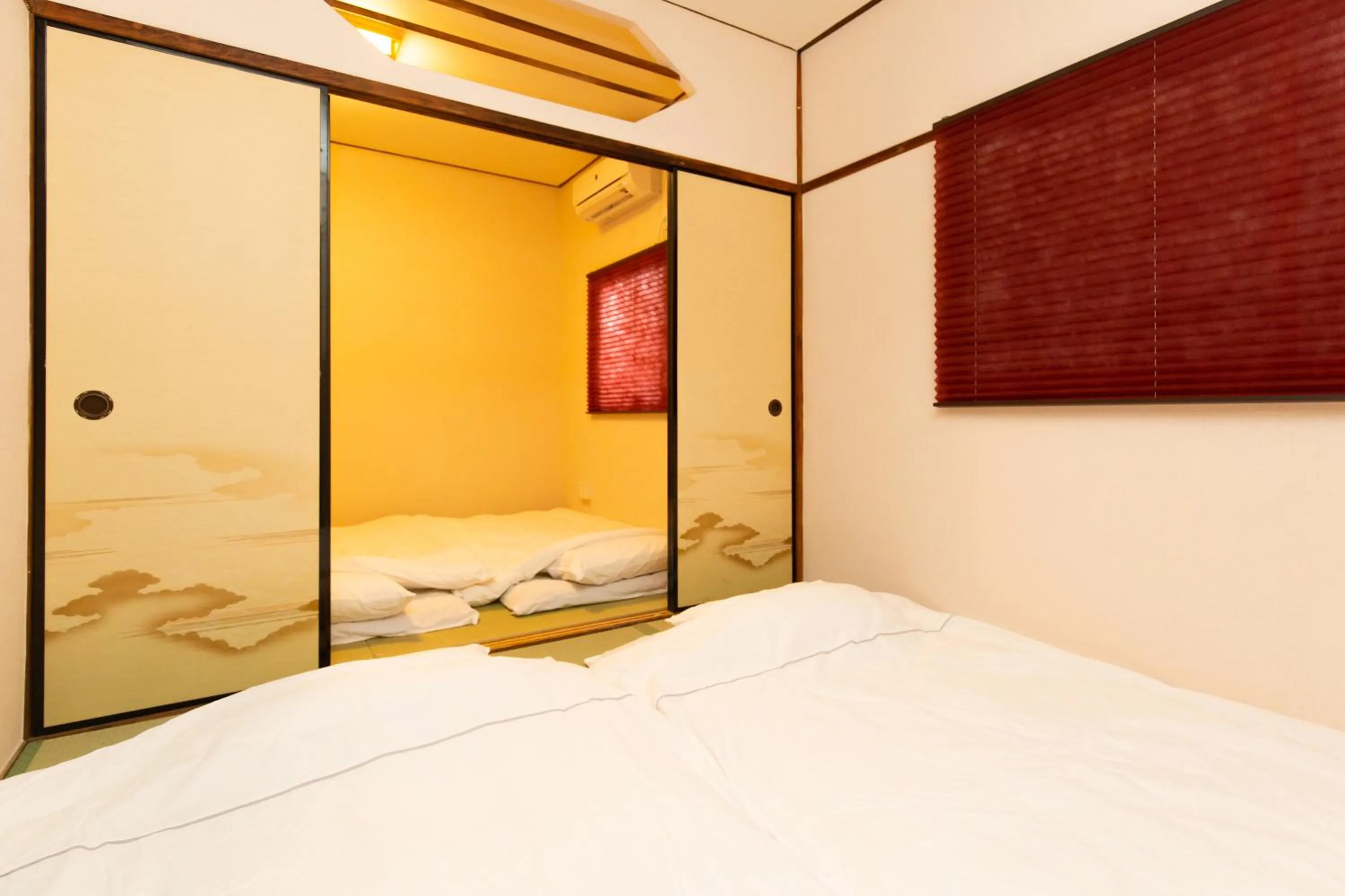 Bedroom, Bed in MON Kishinosato-tamade Ekimae -vacation rental-