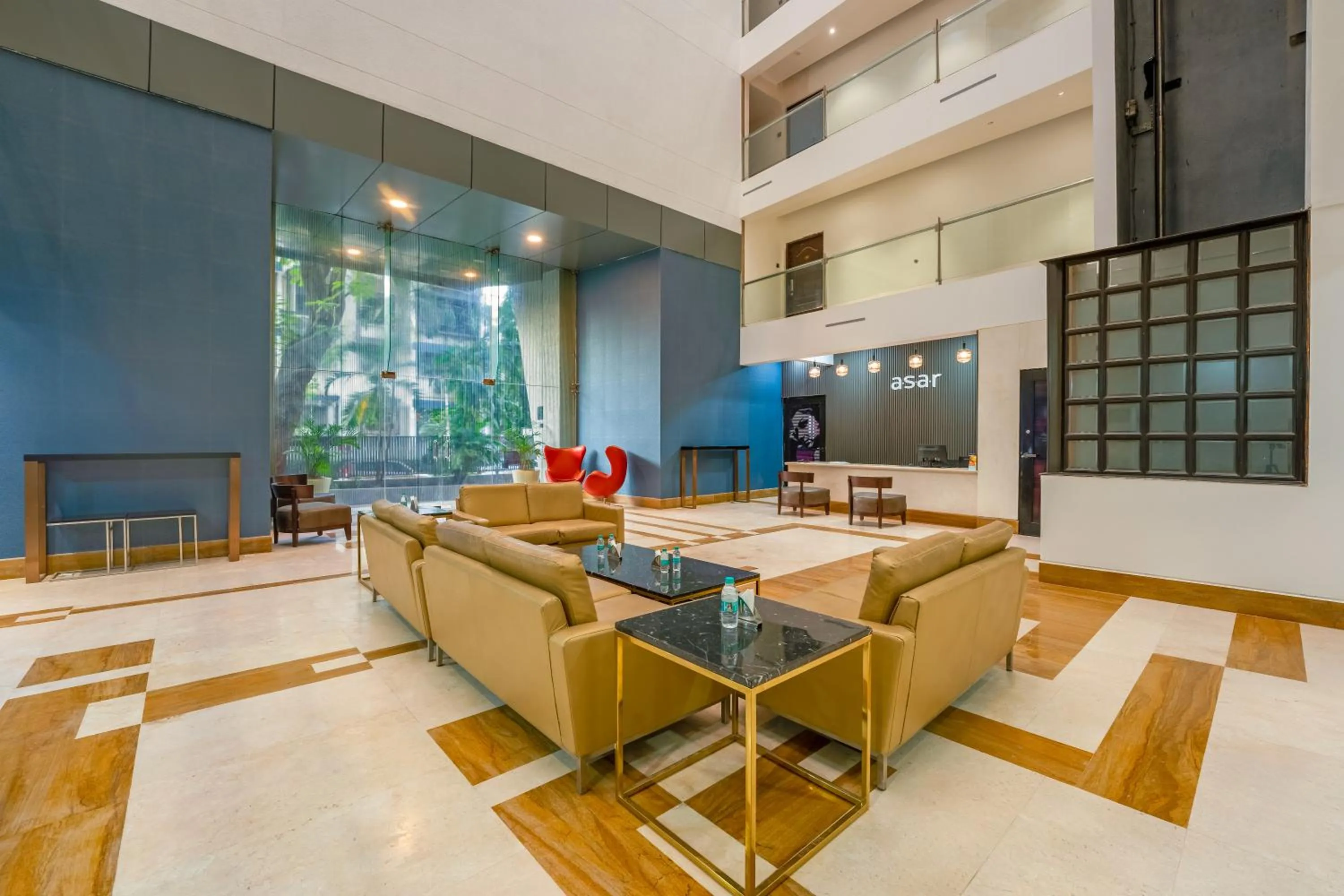 Lobby or reception in asar Landmark Suites Mumbai International Airport by Orion Hotels