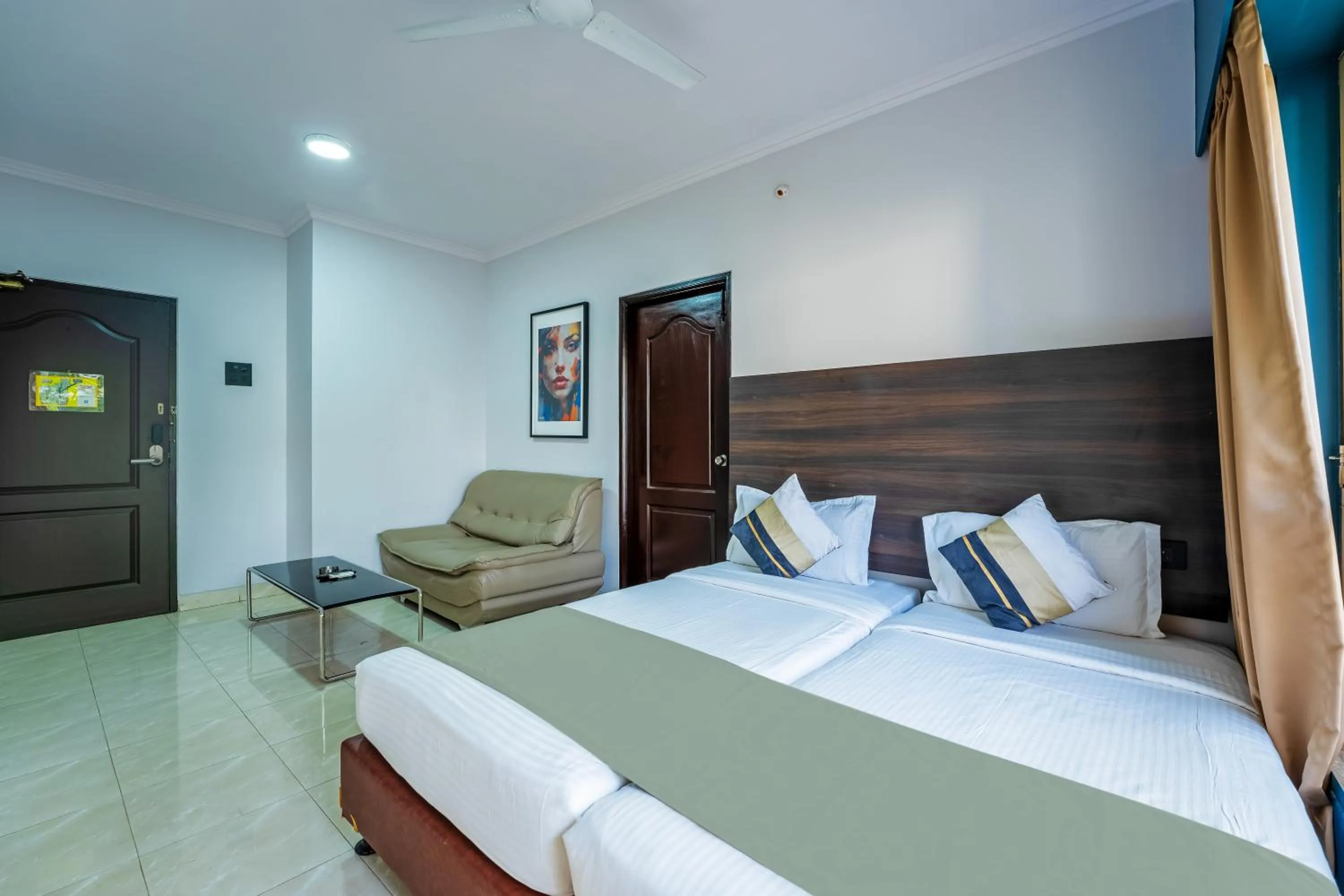 Bed in asar Landmark Suites Mumbai International Airport by Orion Hotels