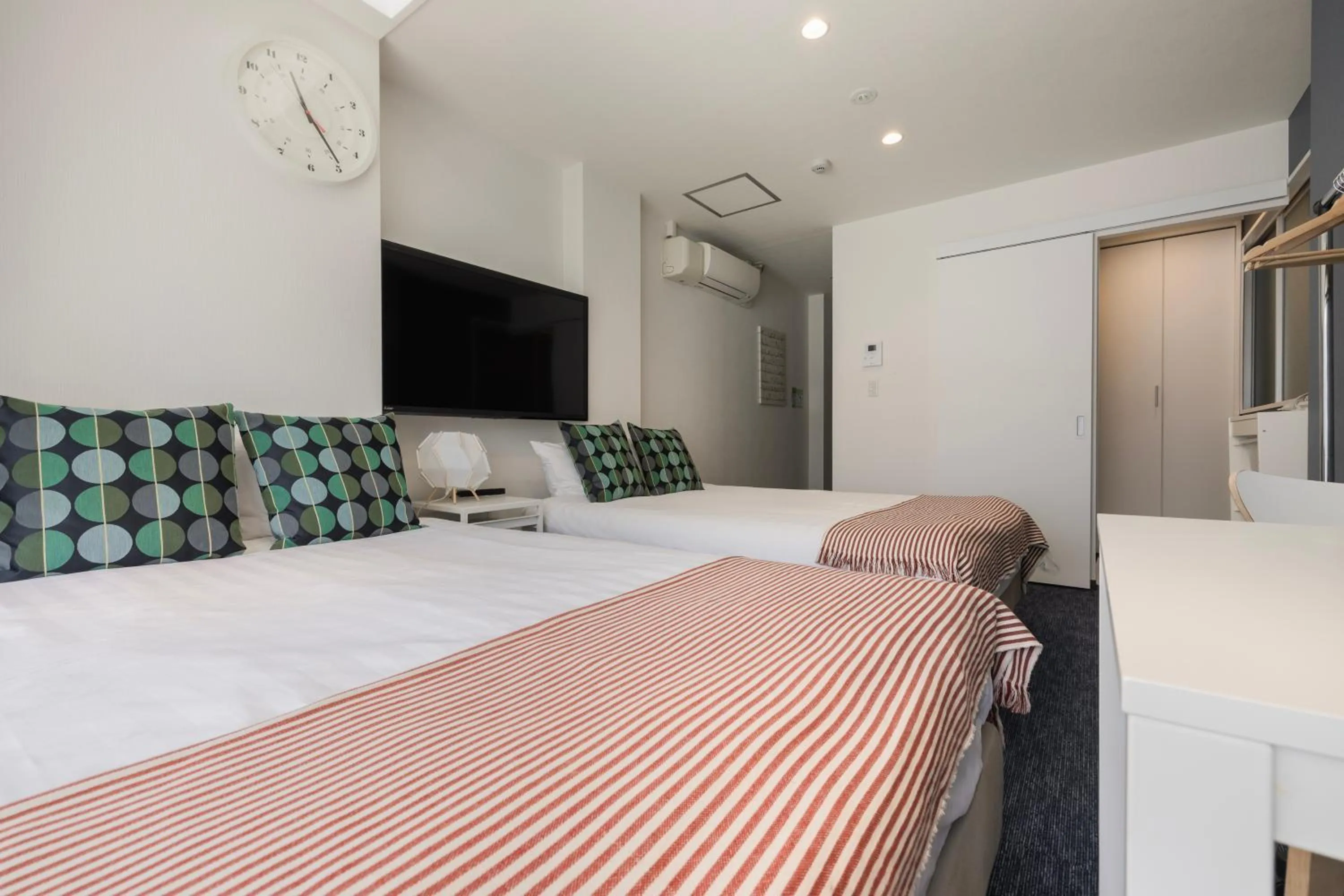 Bed in Namba Garden Square Apartment