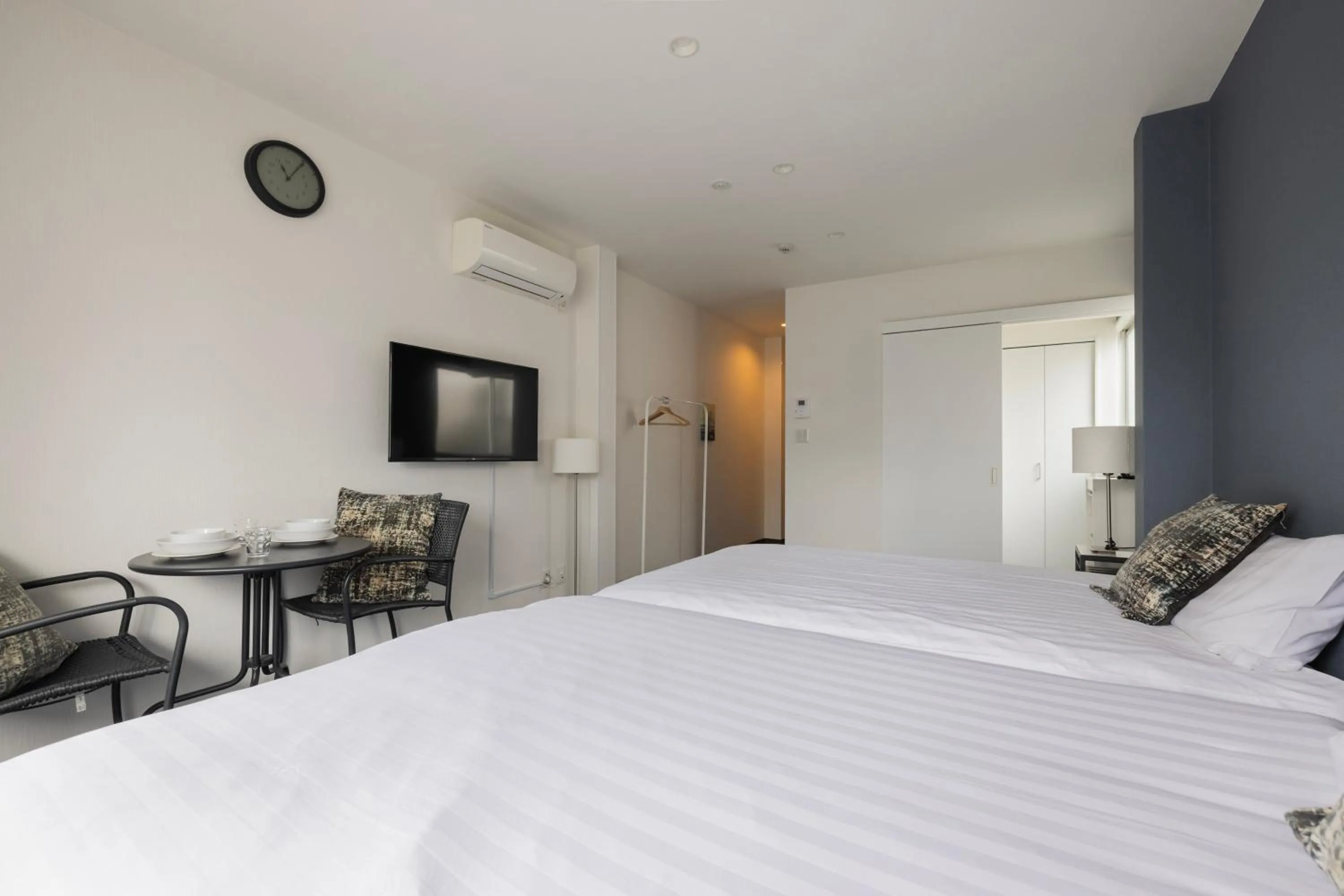 Bed in Namba Garden Square Apartment