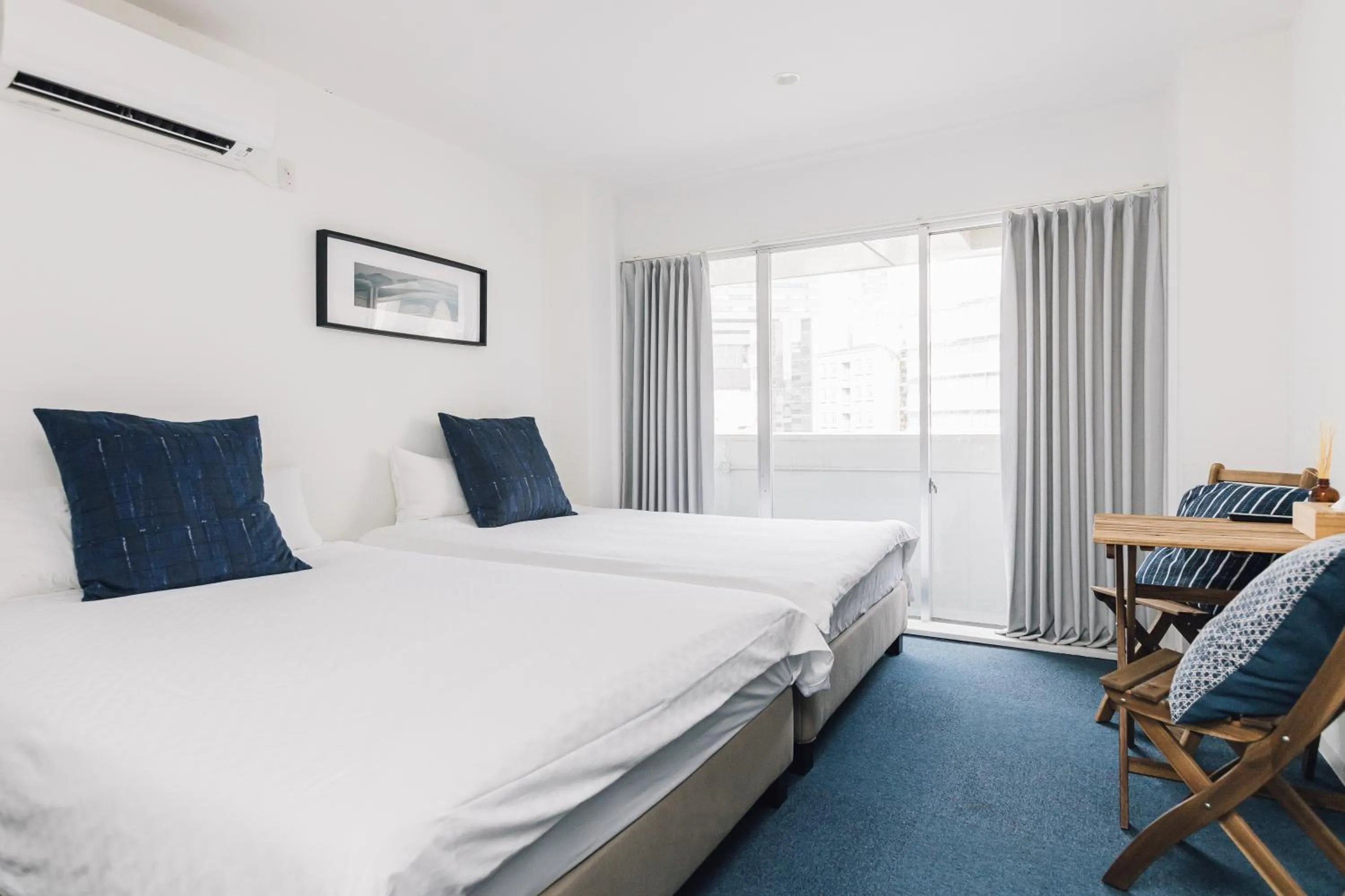 Bed in Namba Garden Square Apartment