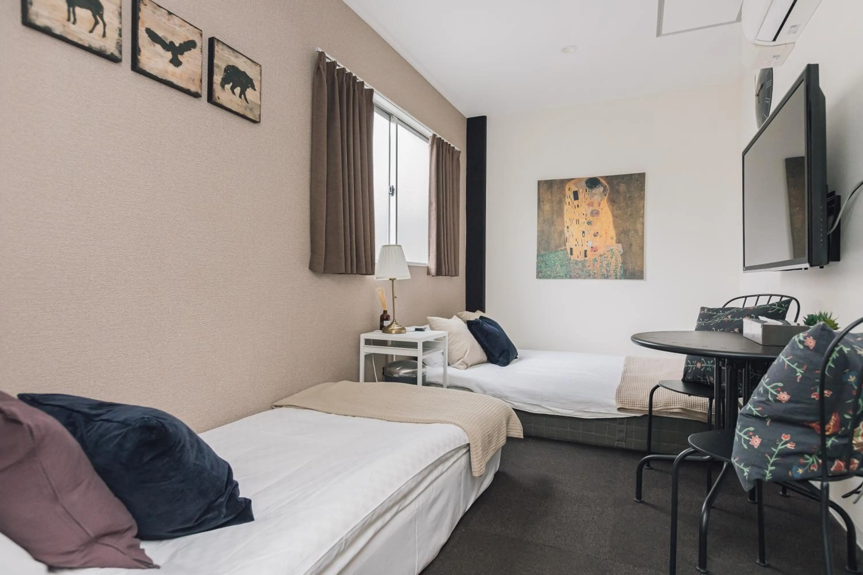 Bed in Namba Garden Square Apartment