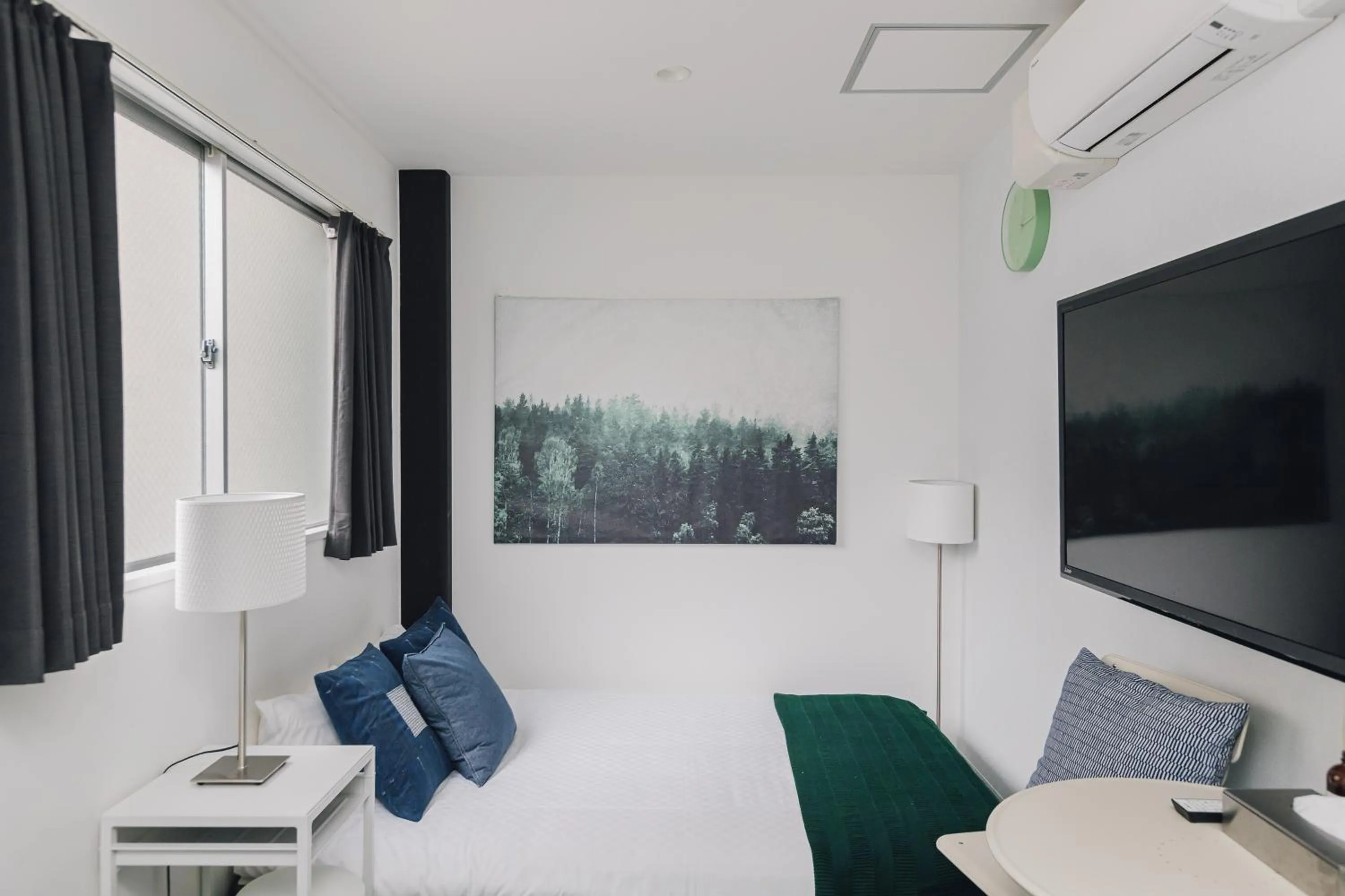 Bed in Namba Garden Square Apartment