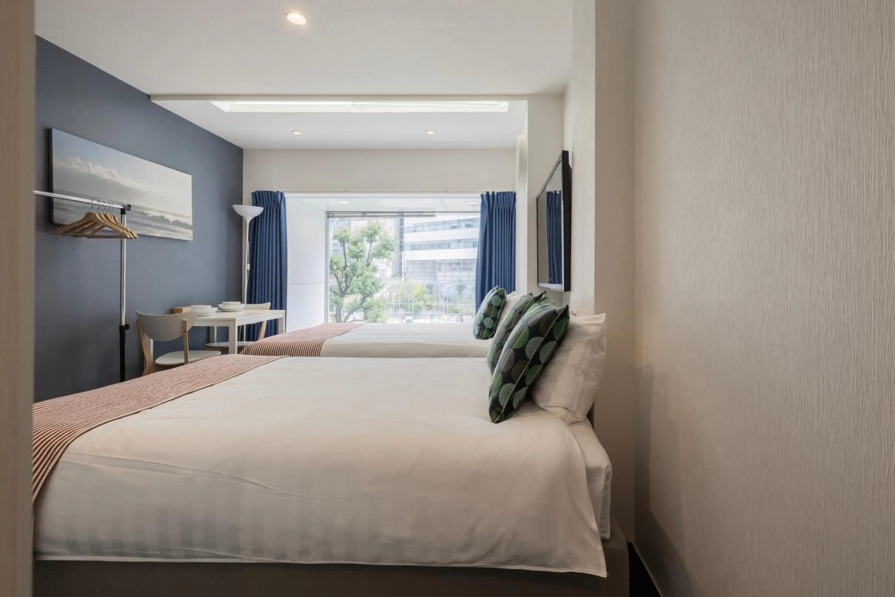 Bed in Namba Garden Square Apartment