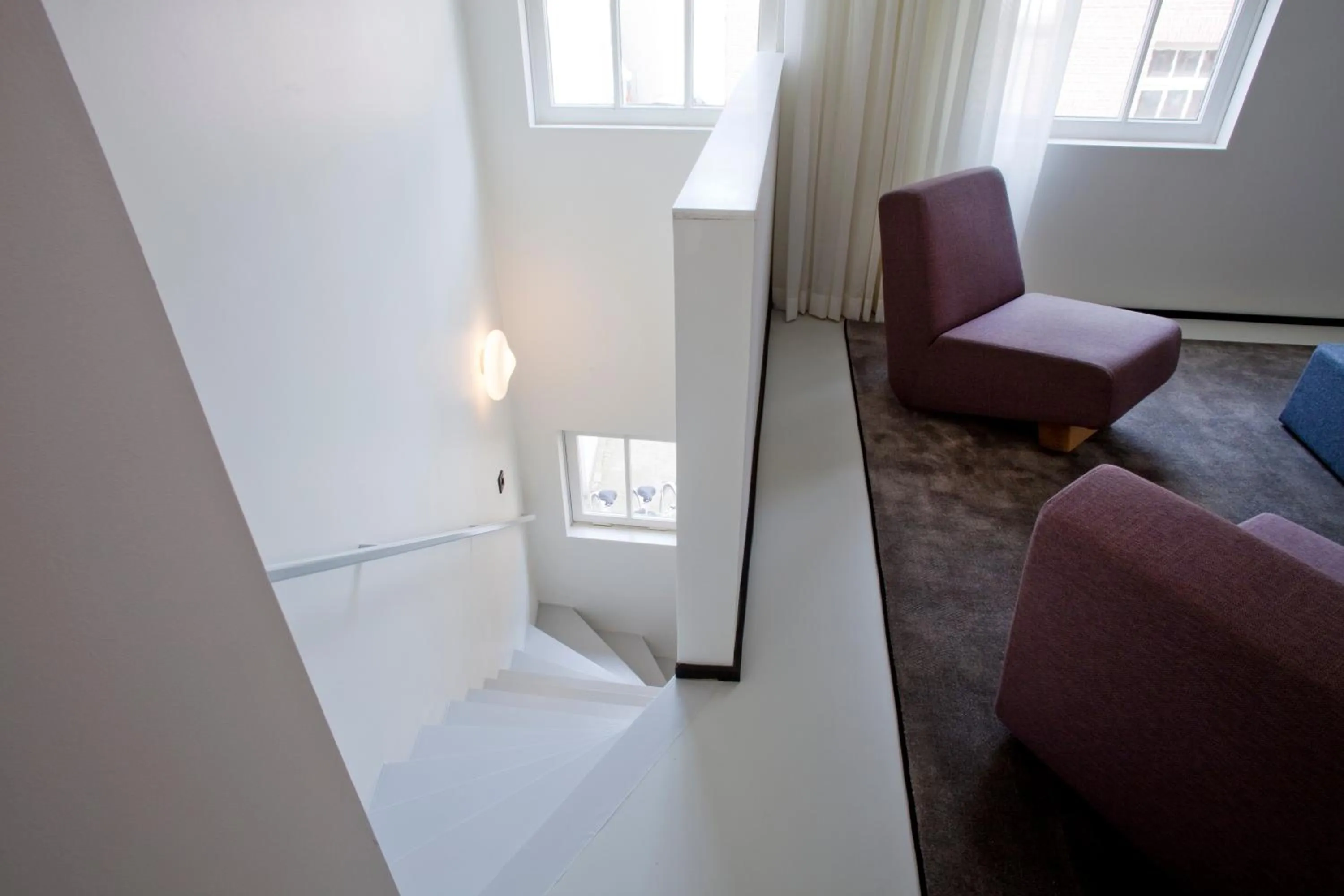 Living room, Bed in Urban Residences Maastricht