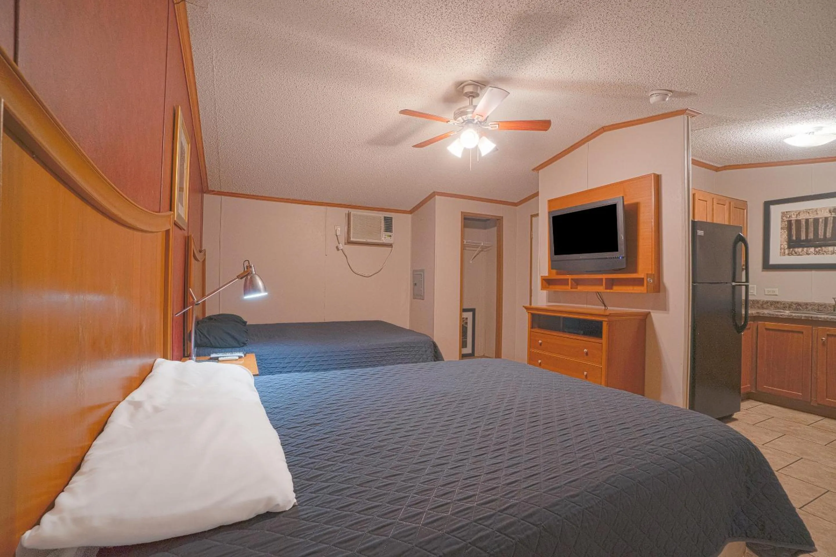Bedroom in Grand Eagle Ford Lodge & RV Park