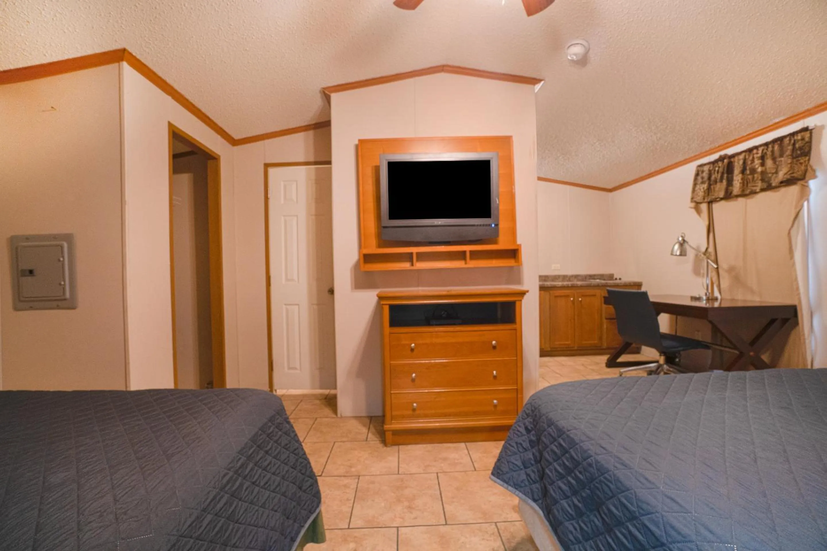 Bedroom in Grand Eagle Ford Lodge & RV Park