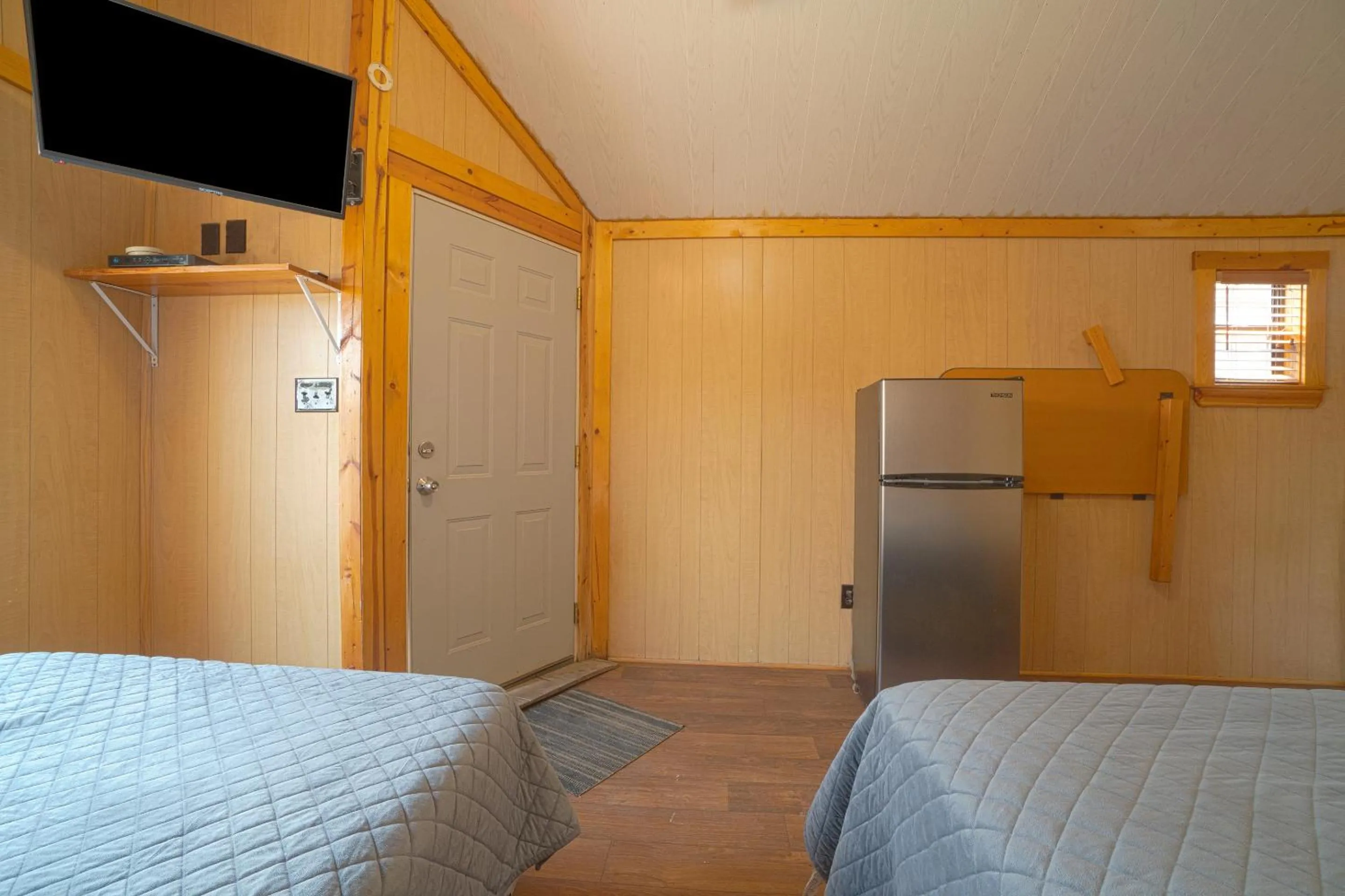 Bedroom in Grand Eagle Ford Lodge & RV Park