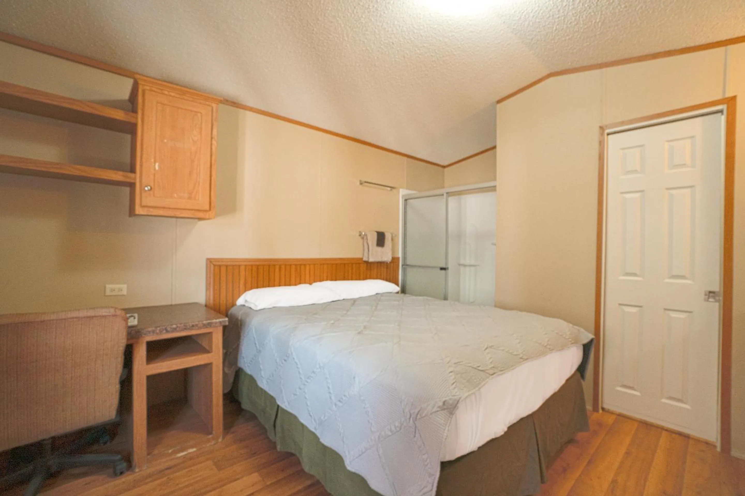 Bedroom in Grand Eagle Ford Lodge & RV Park