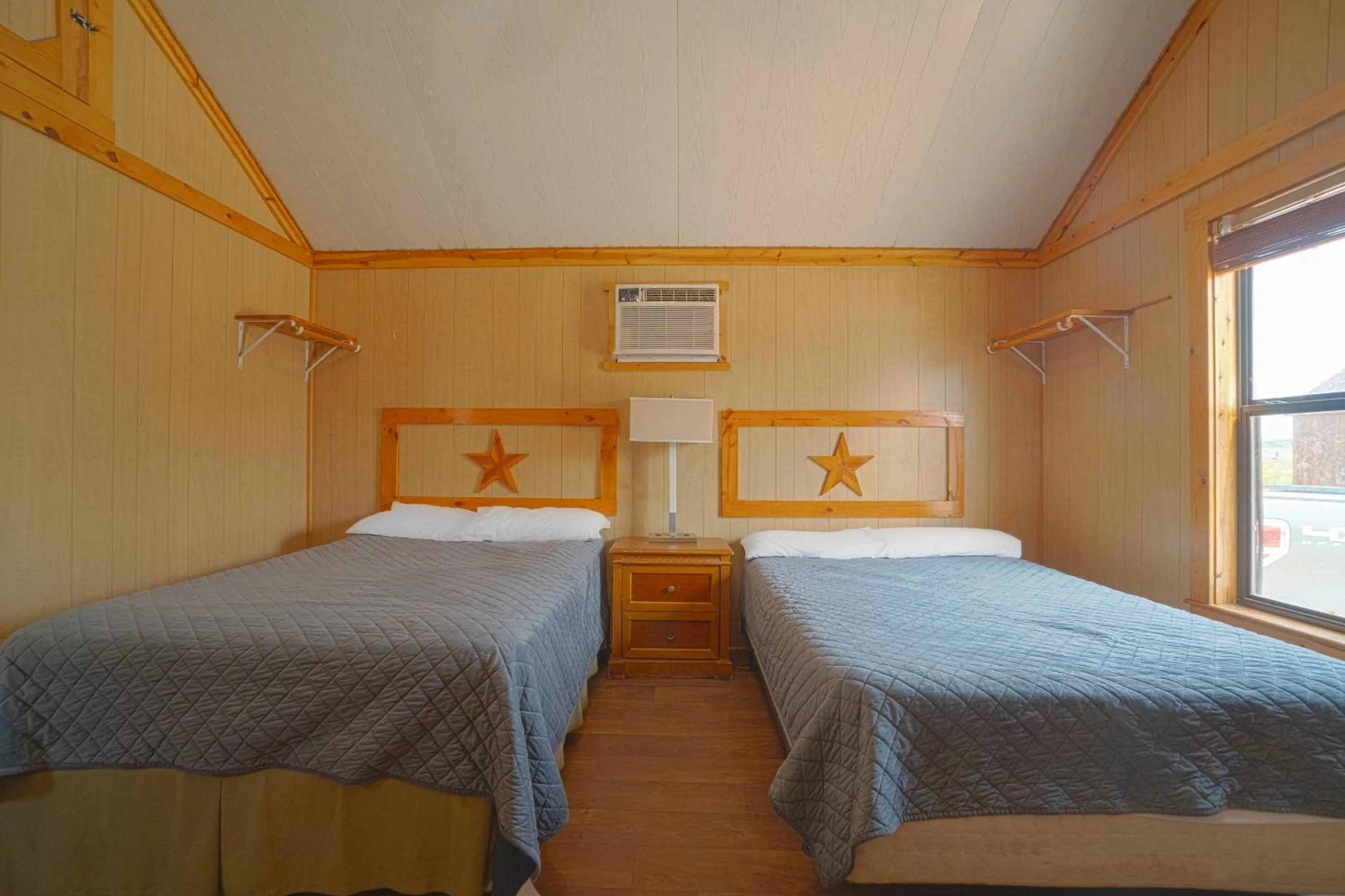 Bedroom in Grand Eagle Ford Lodge & RV Park