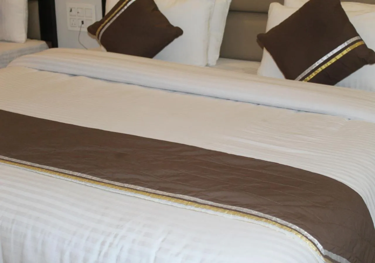 Communal lounge/ TV room, Bed in HOTEL SHIVAYE