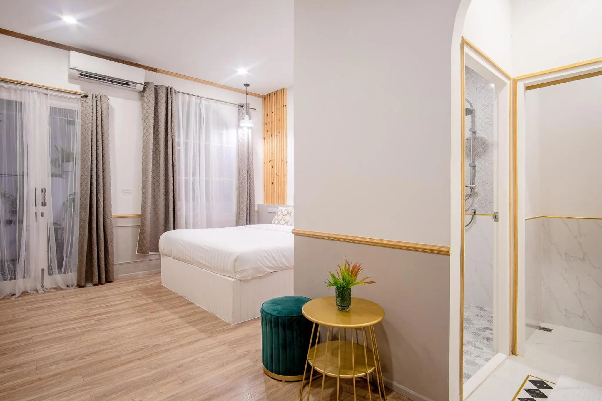 Seating area, Bed in Isara Boutique Hotel and Cafe