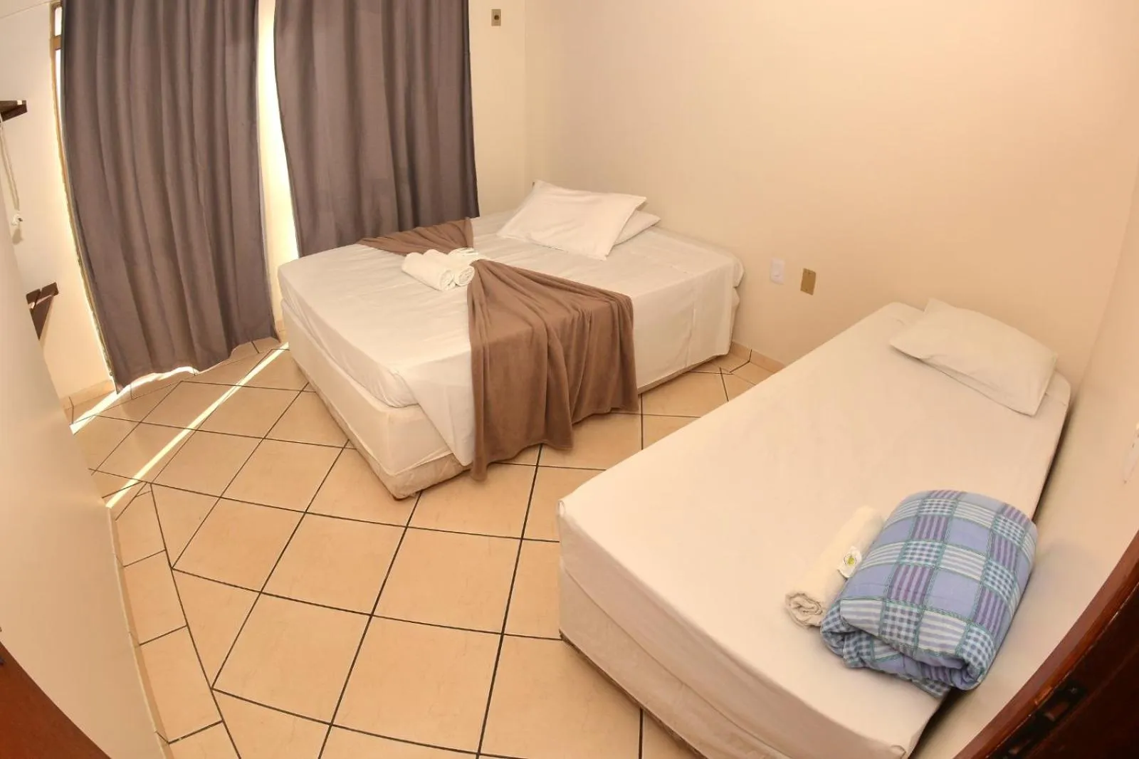 Bed in Hotel Dom Fish